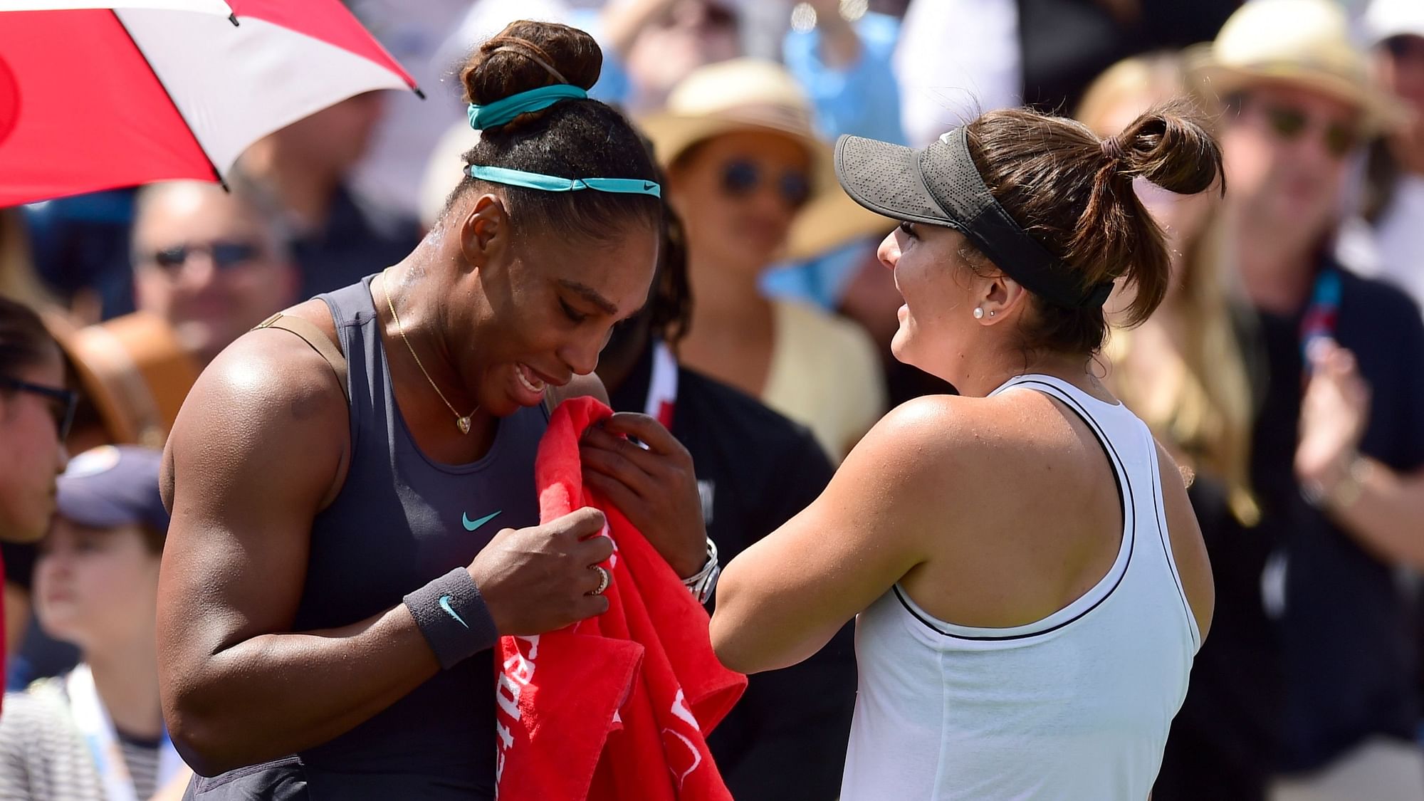 Bianca Andreescu consoles Serena Williams after Williams had to retire from the final of the Rogers Cup in Toronto, Sunday, Aug. 11, 2019.&nbsp;