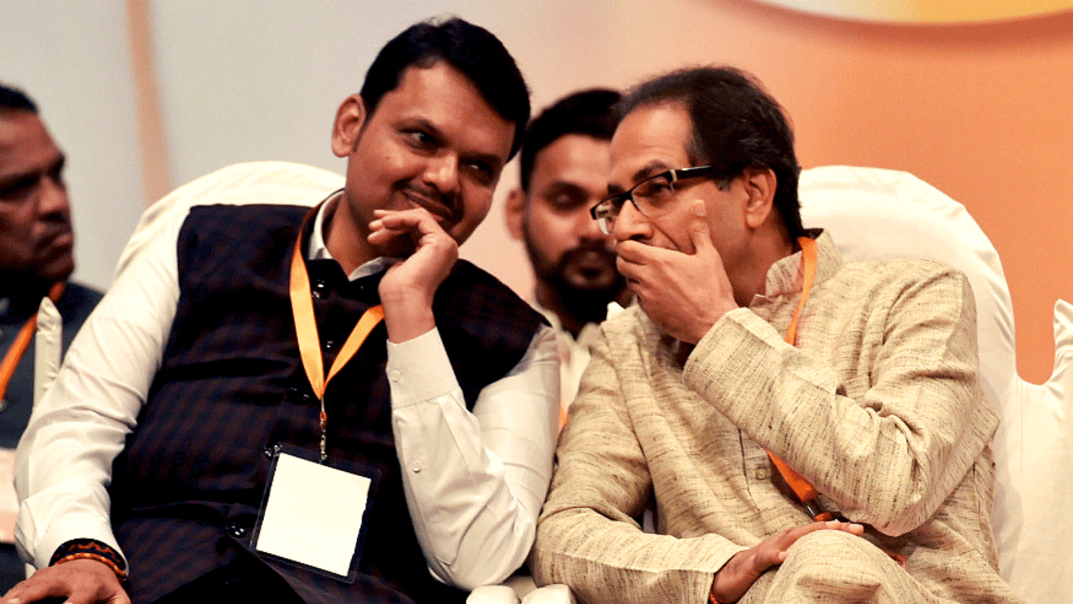 Maharashtra Leader of Opposition Devendra Fadnavis (left) & Chief Minister Uddhav Thackeray (right).