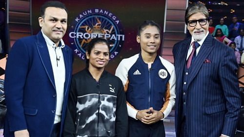 Amitabh Bachchan with Virender Sehwag, Dutee Chand and Hima Das. 