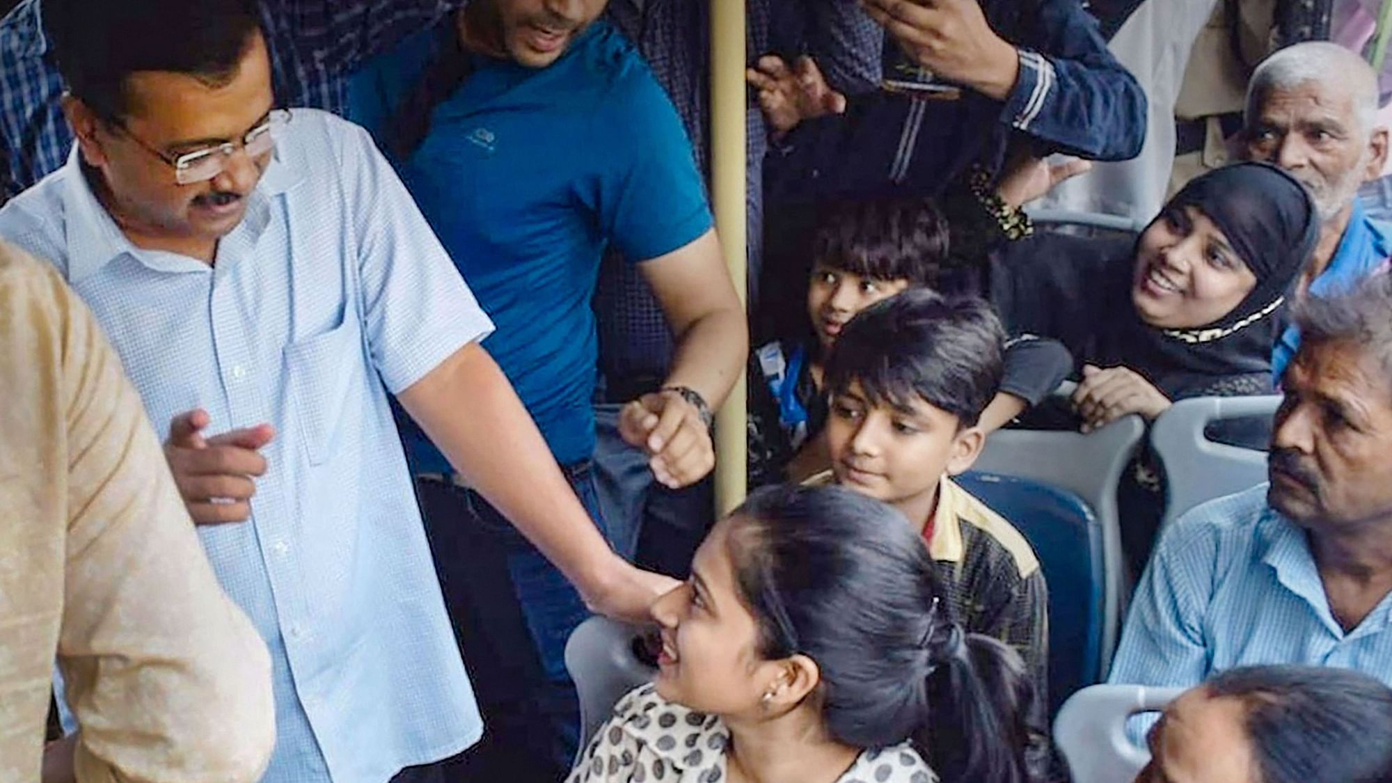  Delhi CM Arvind Kejriwal interacts with women passengers to get feedback about his governments free-ride scheme.