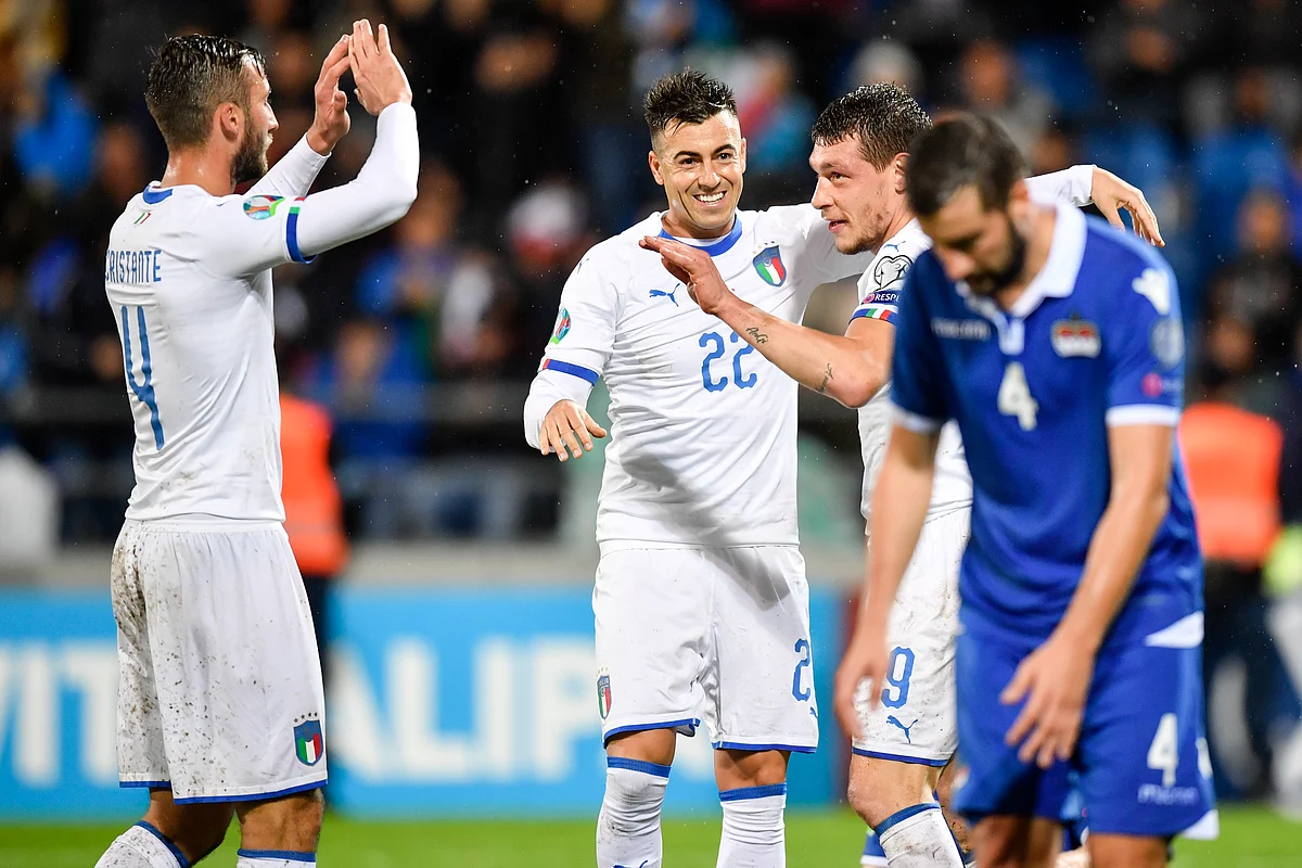 Team Italy celebrates with Andrea Belotti, second right, after scoring to make the score 0-5, against Liechtenstein during during their Euro 2020 Qualifying, Group J soccer match between Liechtenstein and Italy, in Vaduz, Liechtenstein, on Tuesday, Oct. 15, 2019.