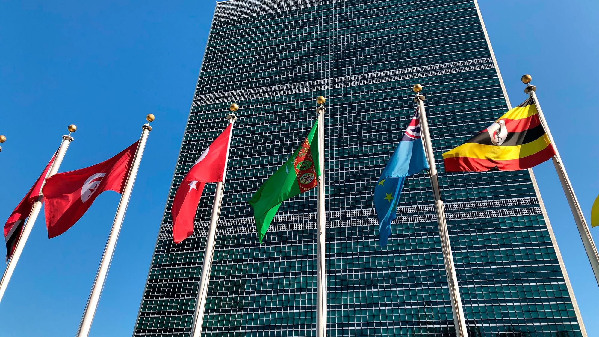 Flags fly outside the UN headquarters during the 74th session of the UNGA on 28 September.