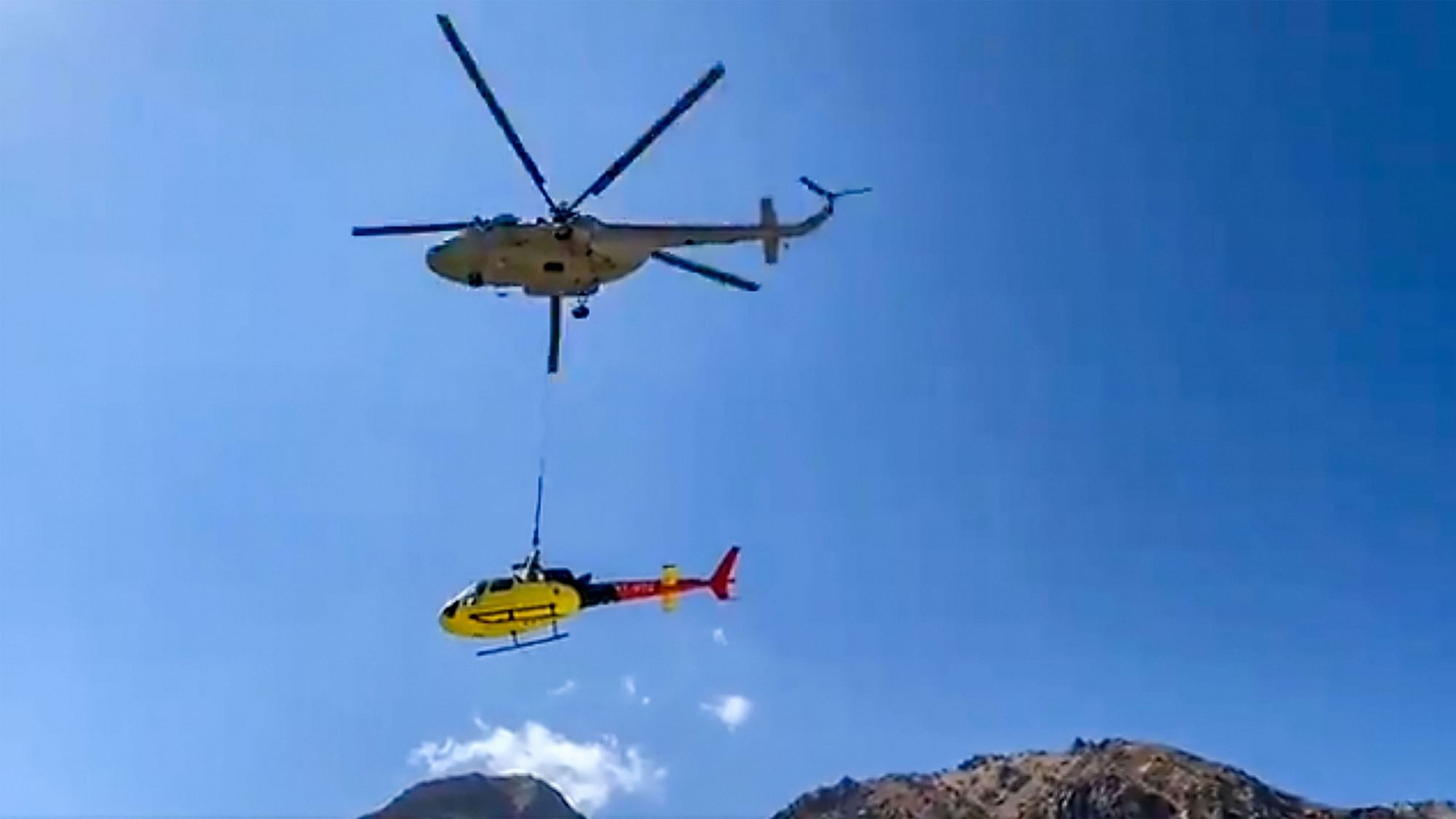 The IAF Mi 17 chopper carries a private helicopter that crashed near Kedarnath.