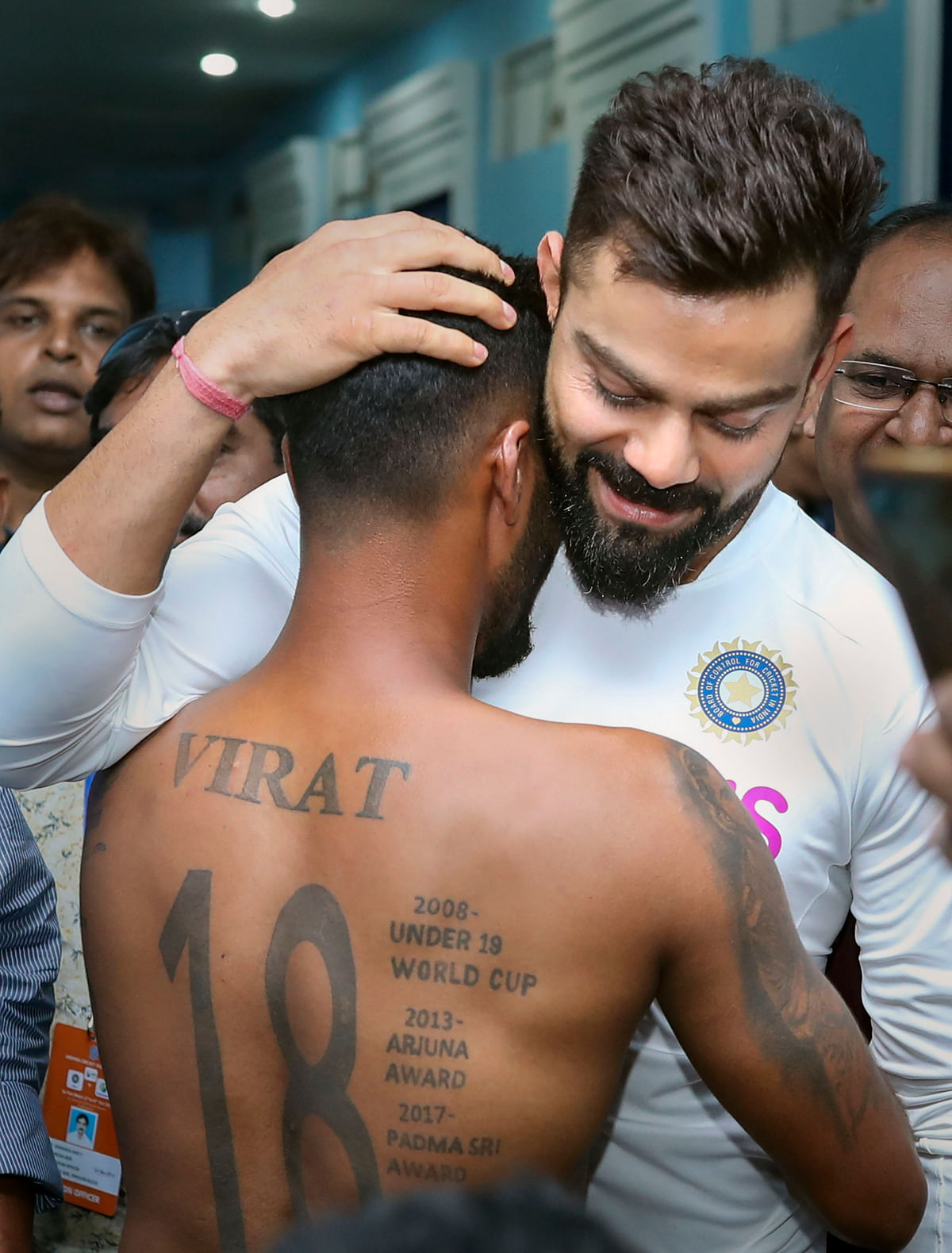 Virat Kohli meets a fan in Visakhapatnam.