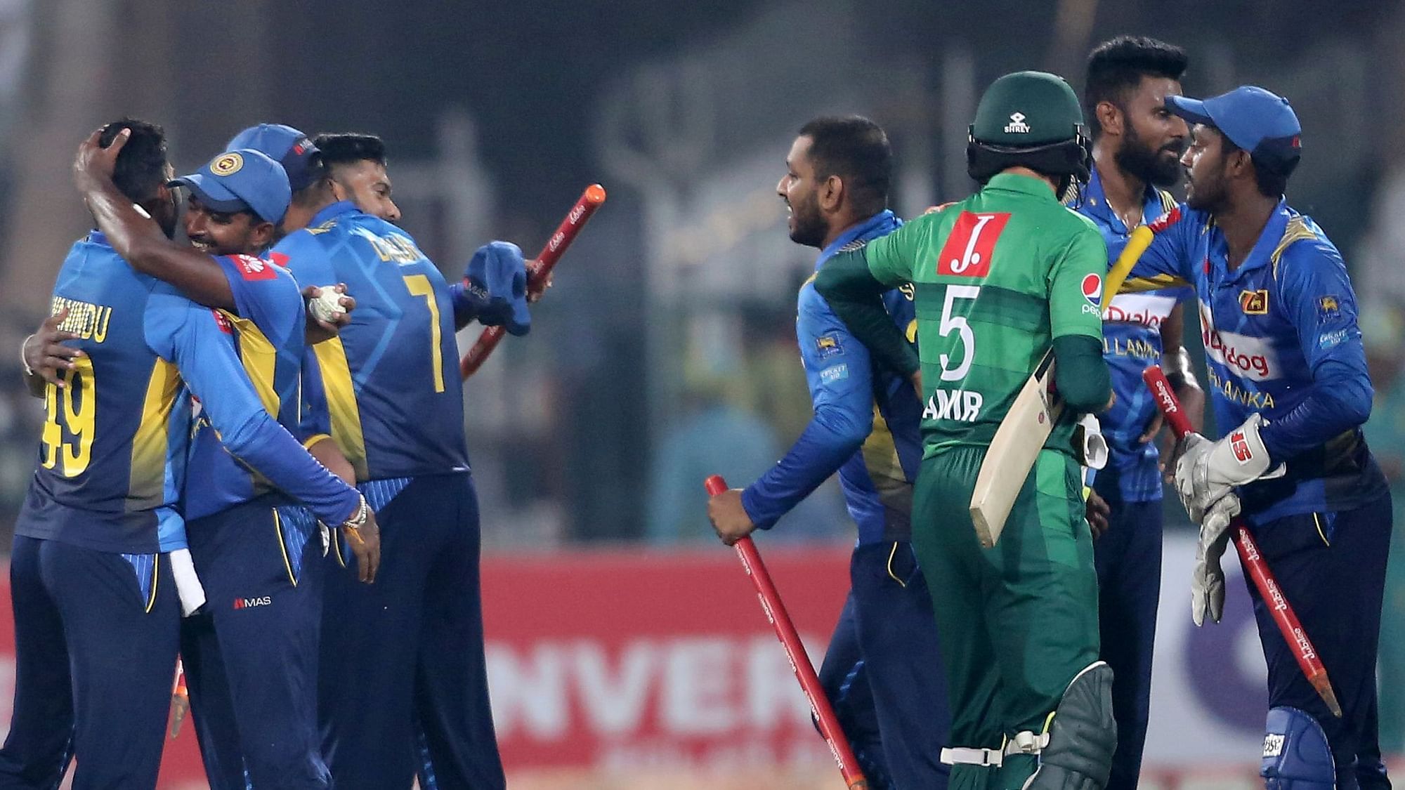 Sri Lankan players celebrate their victory against Pakistan in the second Twenty20 match in Lahore, Pakistan, Monday, Oct. 7, 2019.&nbsp;