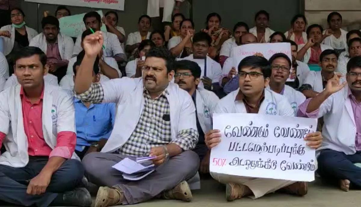 Doctors from Coimbatore Medical College and Hospital raise slogans demanding pay parity.