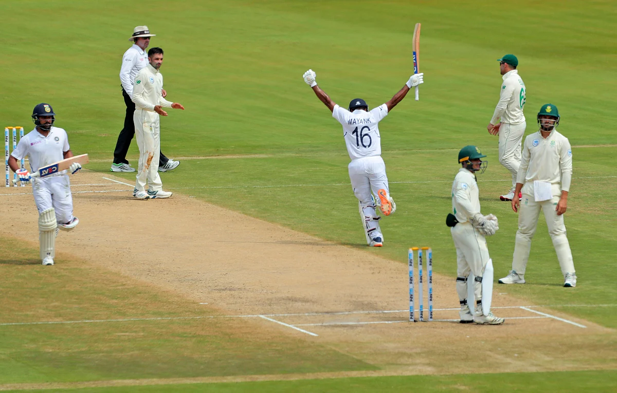 India’s Mayank Agarwal raises his bat after scoring a hundred runs during the second day of the first cricket test match against South Africa in Visakhapatnam, India, Thursday, Oct. 3, 2019. 