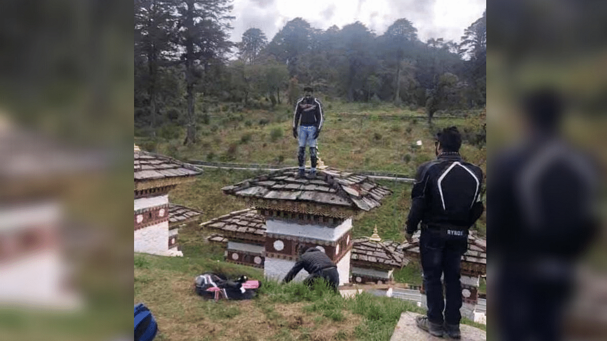 Indian Biker Detained in Bhutan  for Climbing Atop Buddhist Stupa