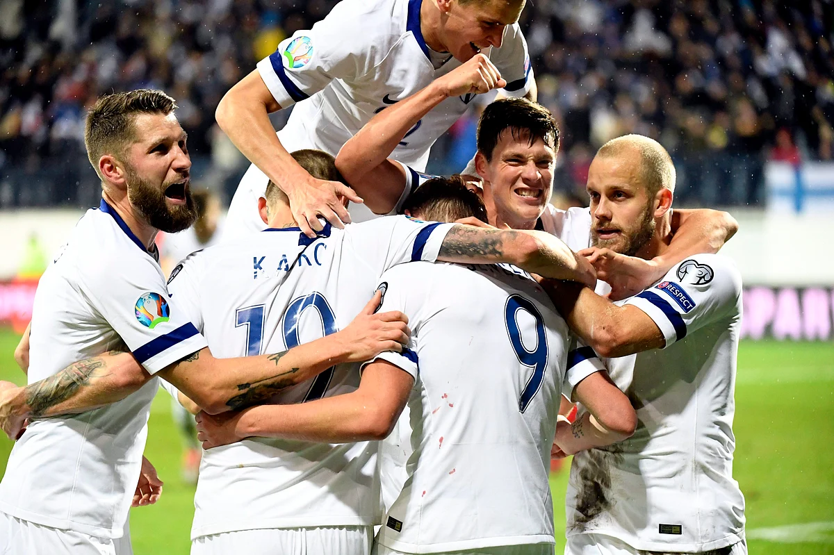 Players of Finland celebrate Fredrik Jensen’s first goal of the game against Armenia, during their Euro 2020 group J qualifying soccer match in Turku, Finland, Tuesday Oct. 15, 2019.