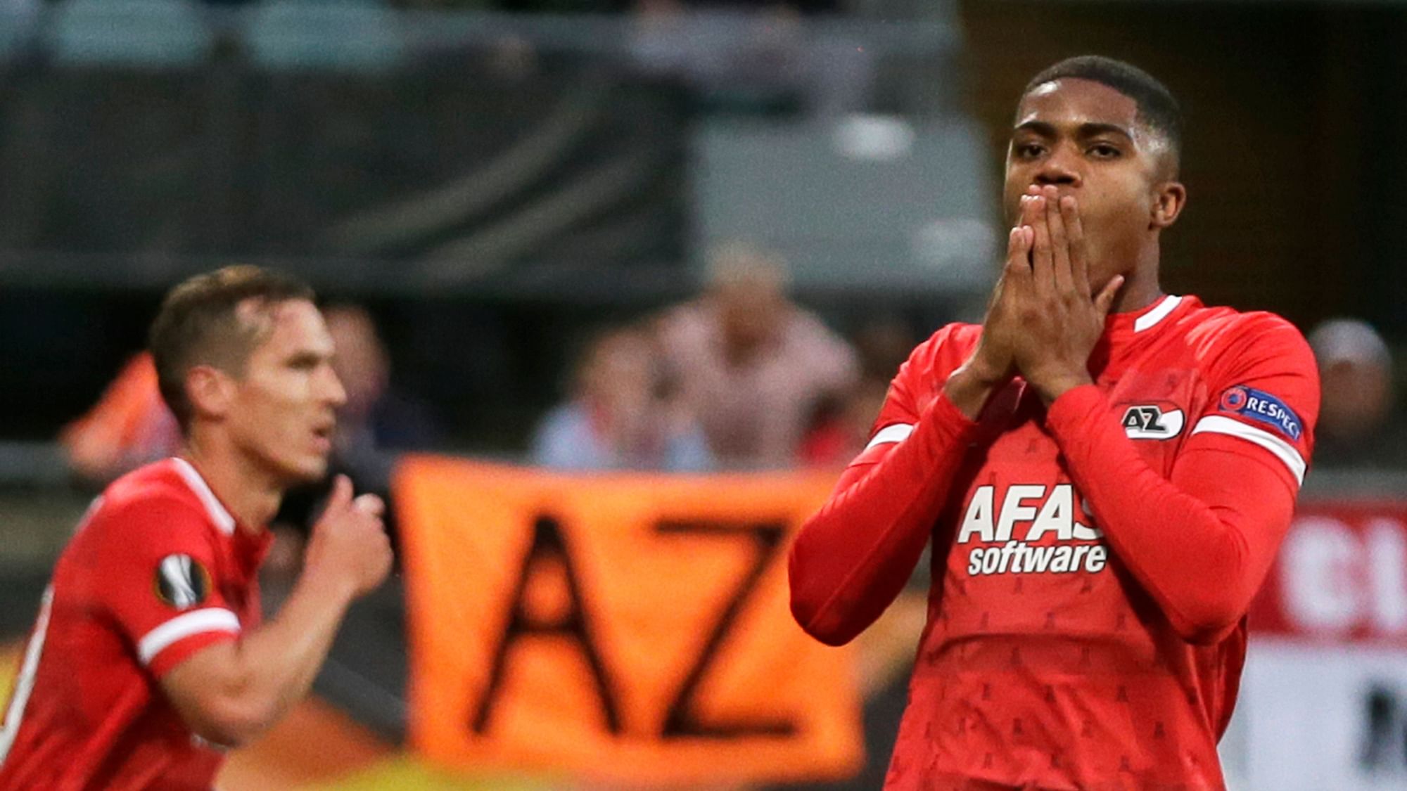 Alkmaar’s Myron Boadu, right, reacts after his goal was disallowed for offside during the group L Europa League soccer match between AZ Alkmaar and Manchester United at the ADO Den Haag stadium in The Hague.