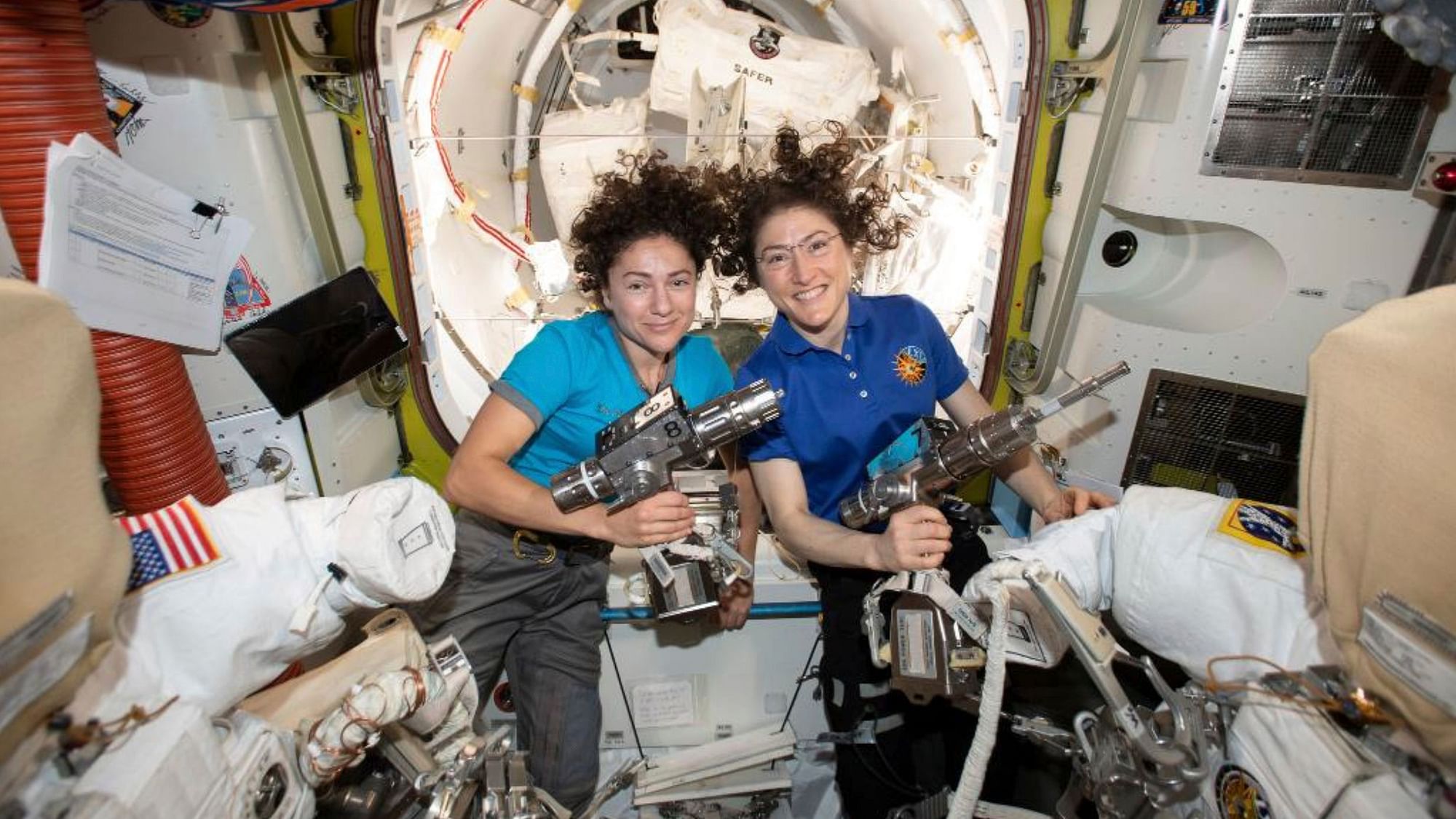 In this photo released by NASA on Thursday, 17 October, US astronauts Jessica Meir, left, and Christina Koch pose for a photo in the International Space Station.&nbsp;