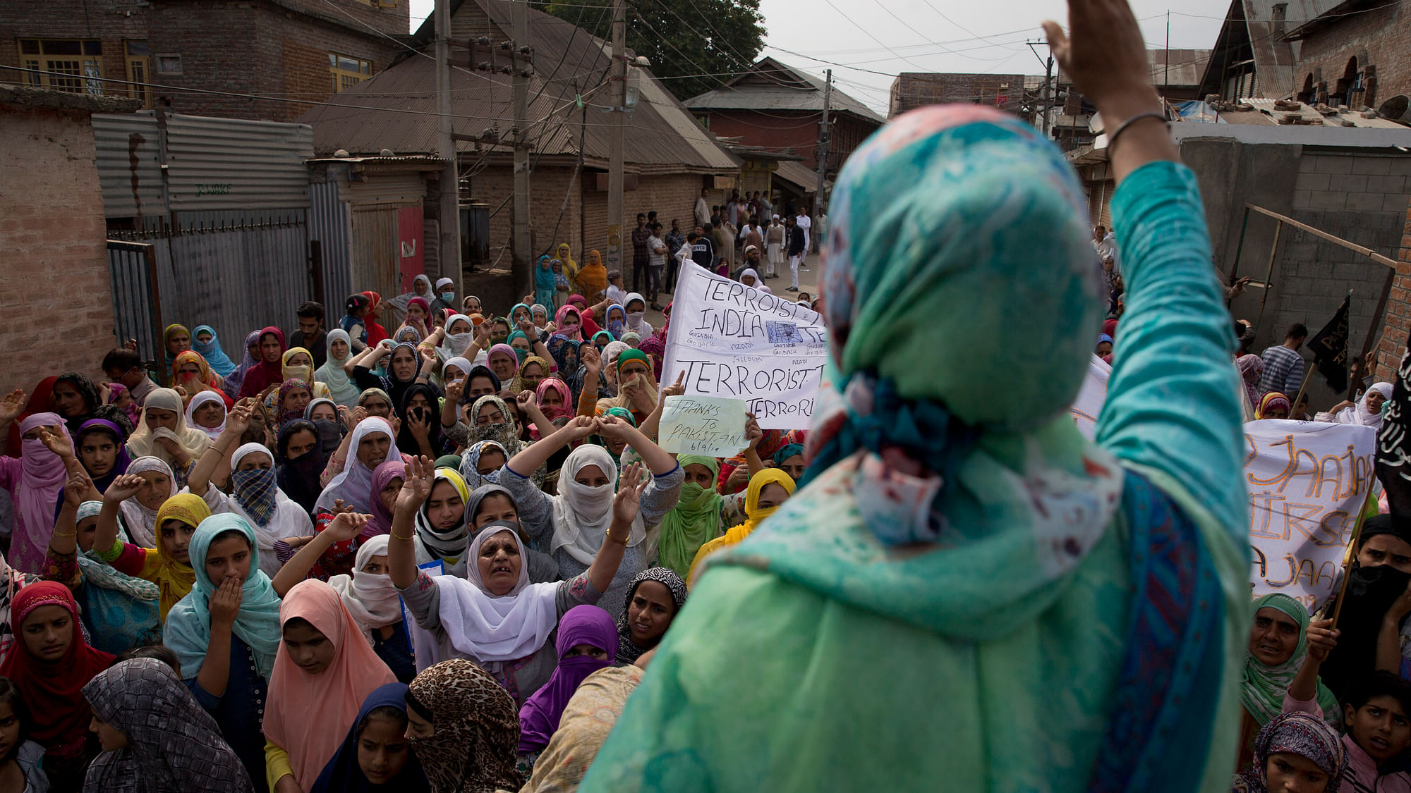 Kashmiri women shout freedom slogans during a protest in Srinagar on 27 September.