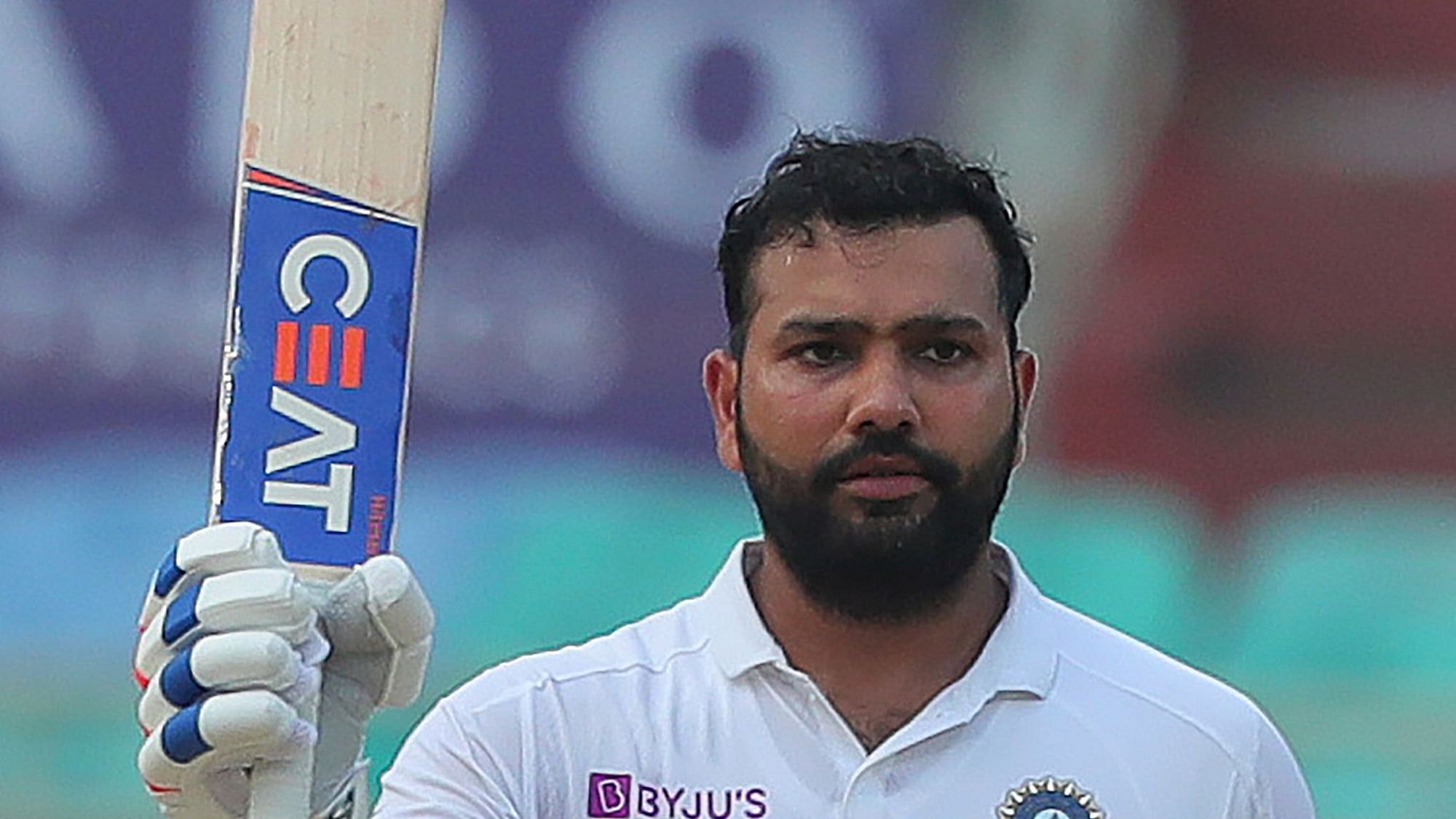 India’s Rohit Sharma raises his bat after scoring a century during the fourth day of the first cricket test match against South Africa in Visakhapatnam, India, Saturday, Oct. 5, 2019.&nbsp;