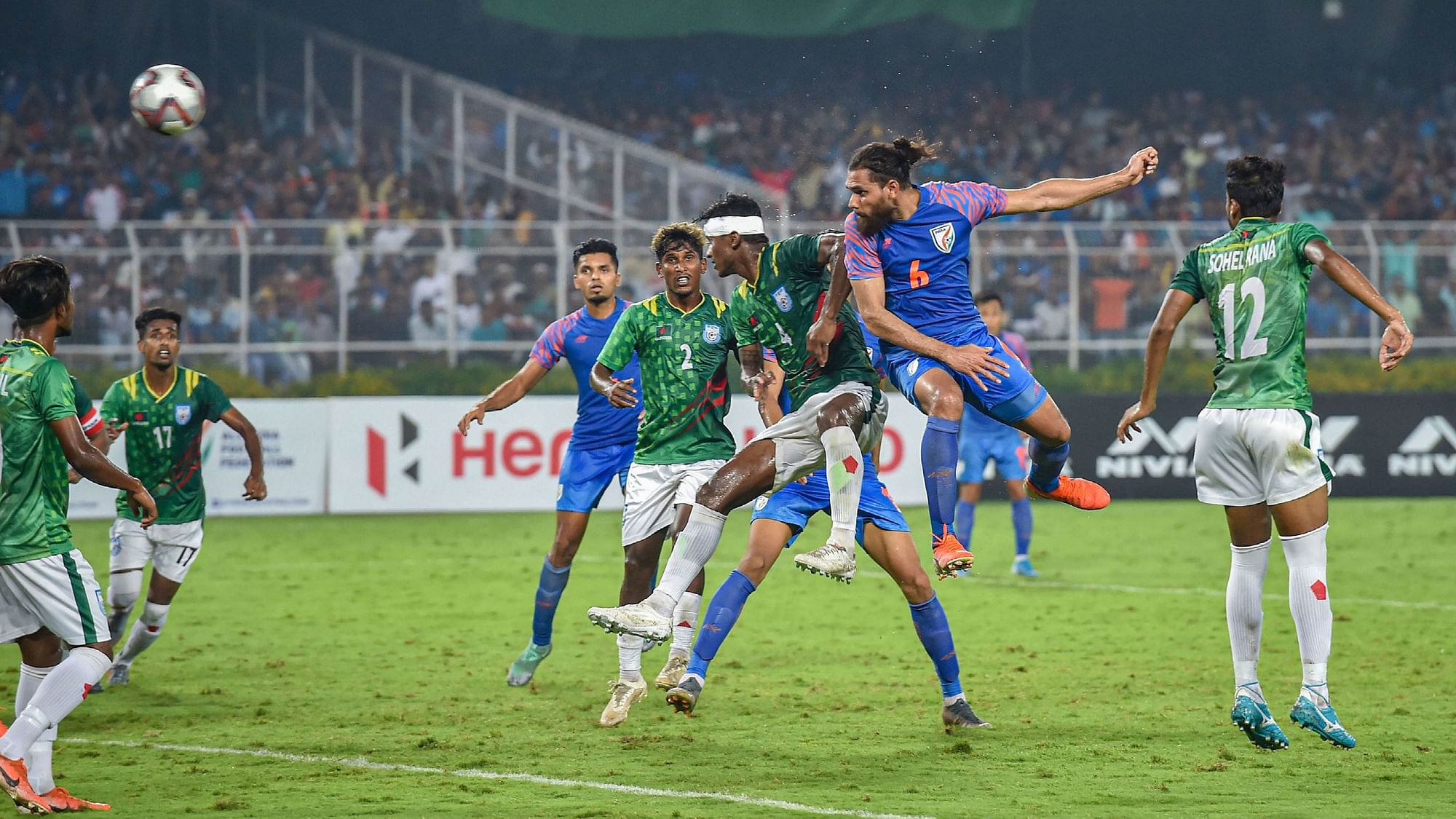 India’s Adil Khan (centre) nodded home a Brandon Fernandes corner kick in the 88th minute to help India equalise.