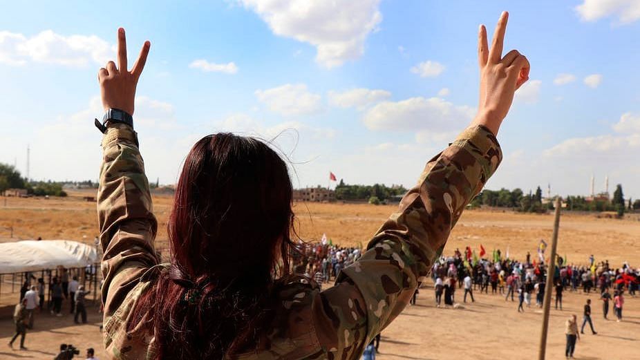 Kurdish fighters in Syria say the US is abandoning its allies and potentially empowering the Islamic State by withdrawing from northeastern Syria and allowing a Turkish assault, 7 Oct 2019. 