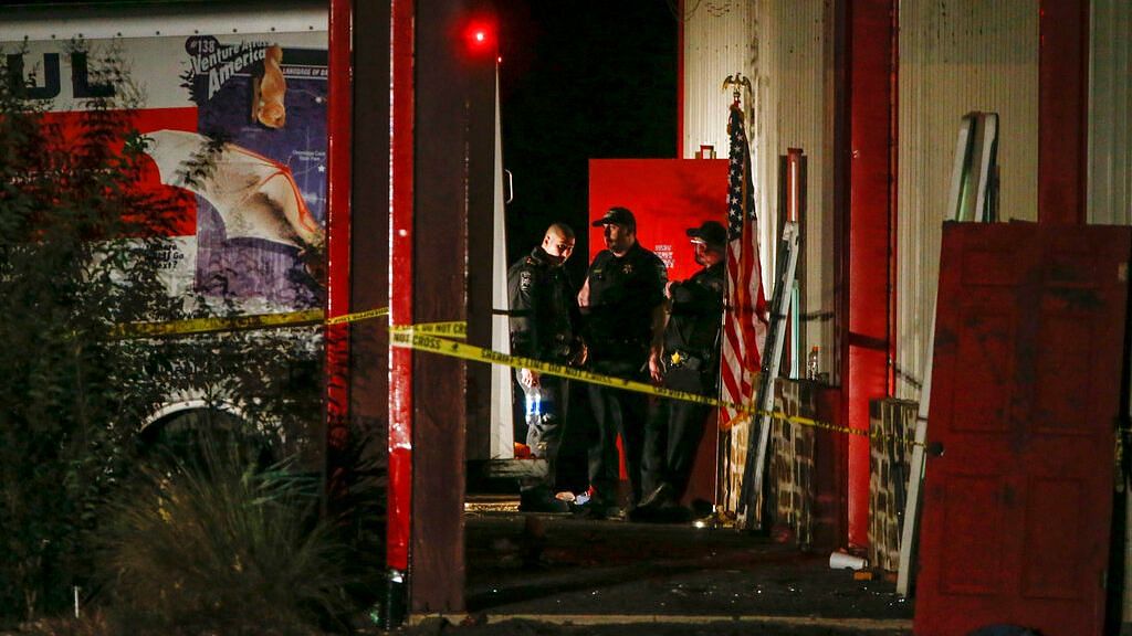 Officials work a crime scene after a shooting at Party Venue on Highway 380 in Greenville, Texas, on Sunday, 27 October.