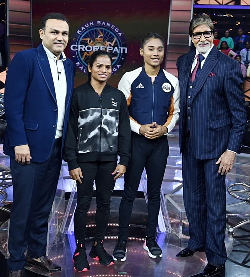 Amitabh Bachchan with Virender Sehwag, Dutee Chand and Hima Das.