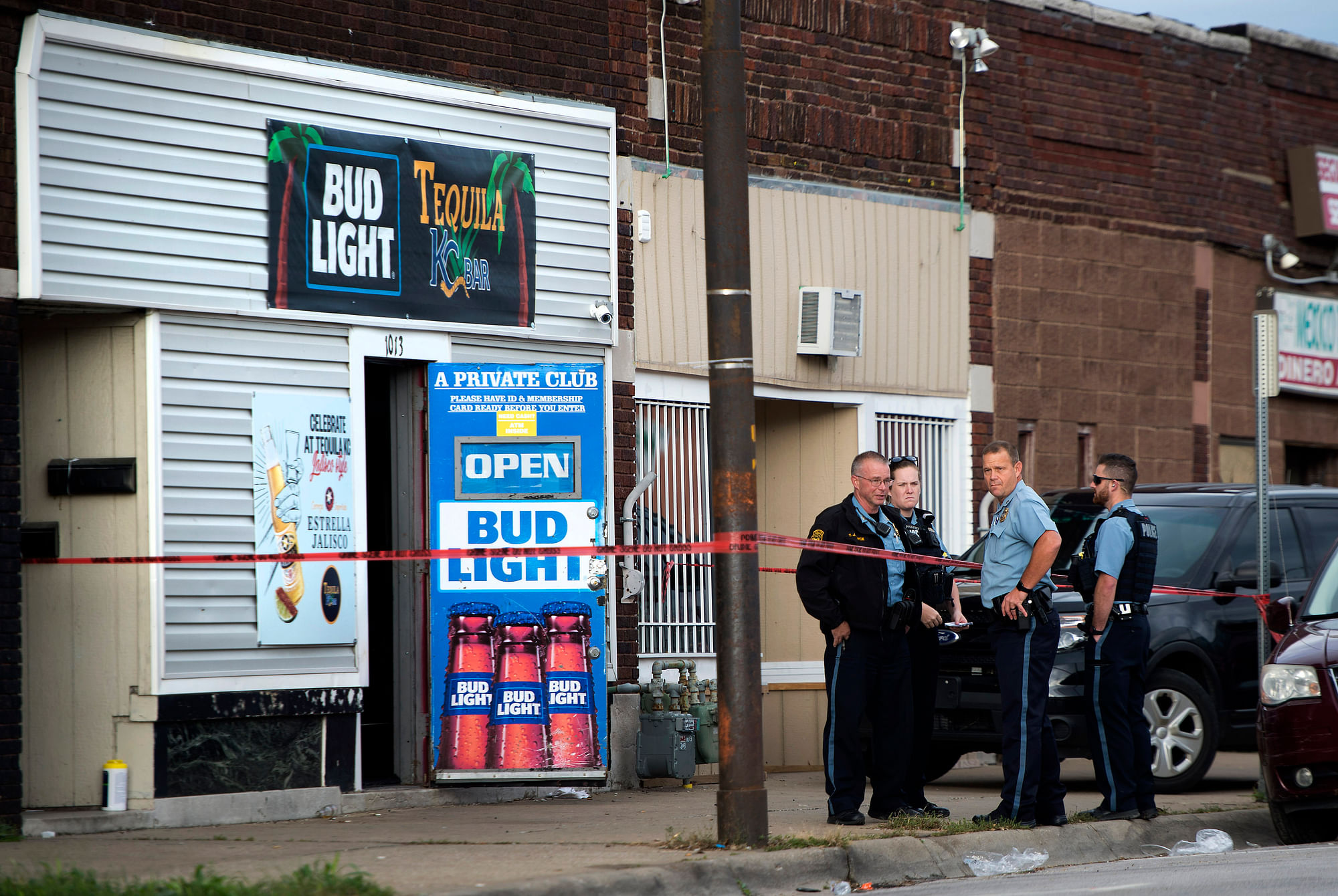 Police investigate the scene of a shooting at Tequila KC Bar on Sunday, 6 October, in Kansas City, Kansas.
