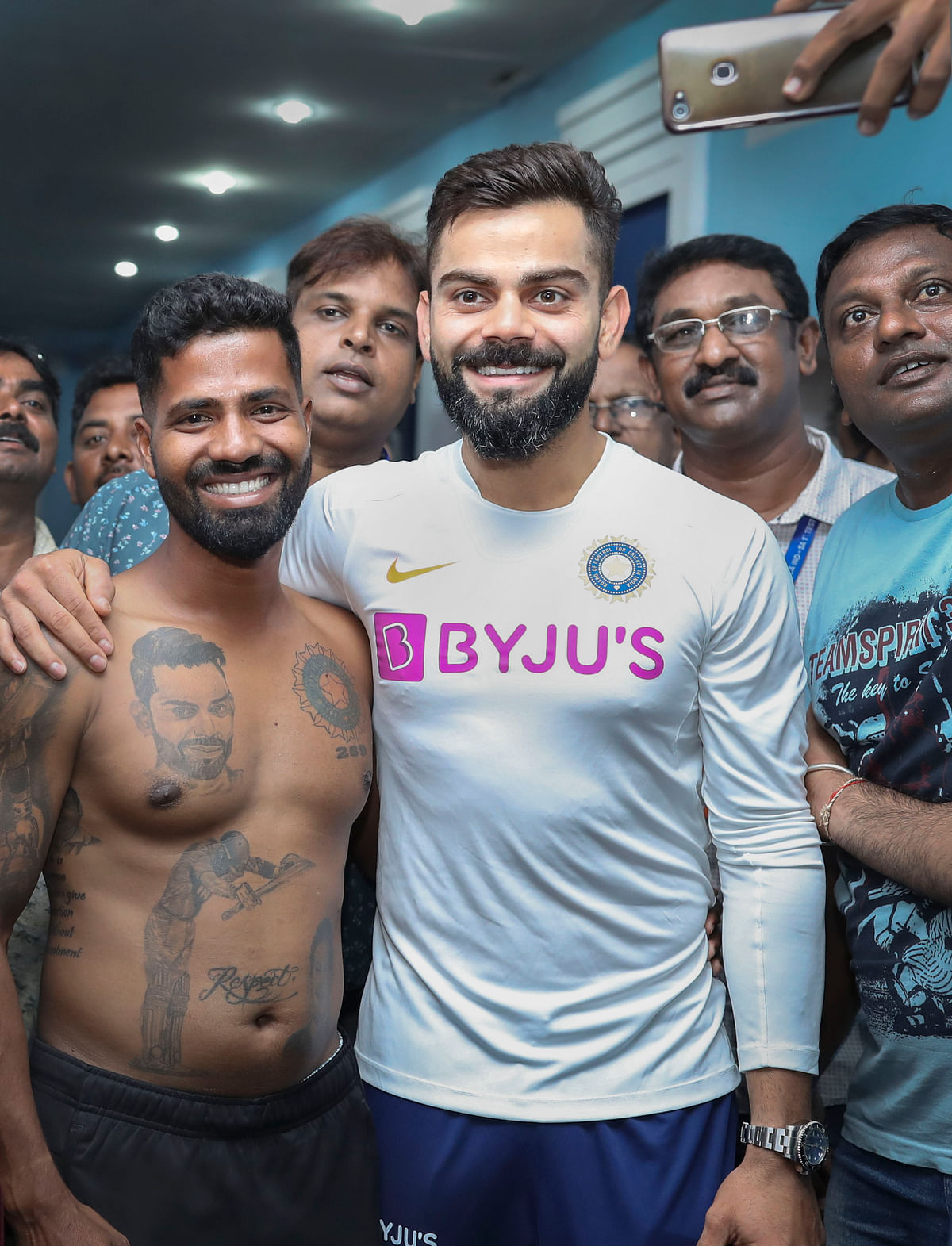 The said fan was seen sporting a tattoo of Virat’s face on his chest.