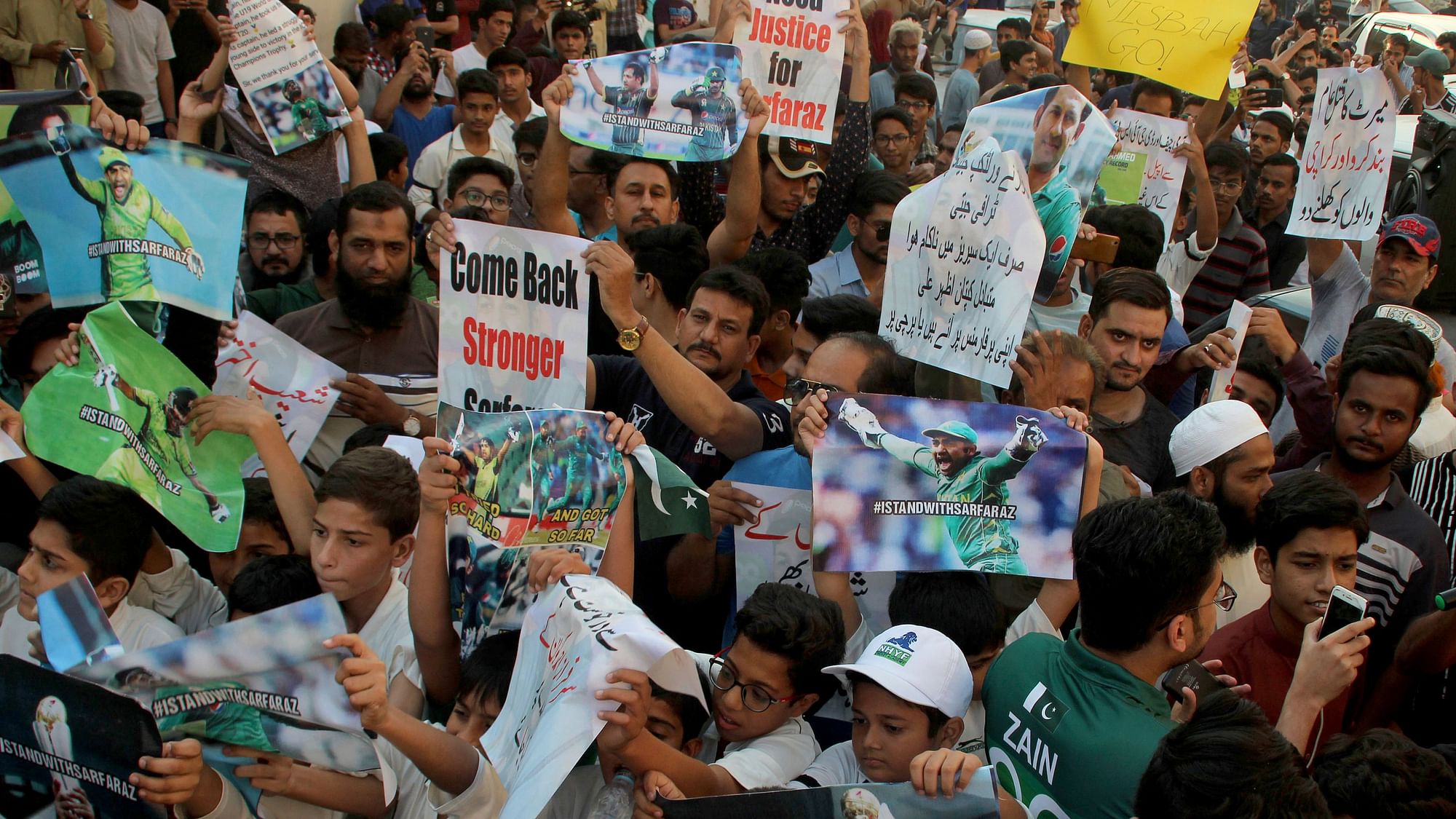 Dozens of people have protested the firing of Sarfaraz Ahmed as captain of Pakistan’s Test and Twenty20 cricket teams.