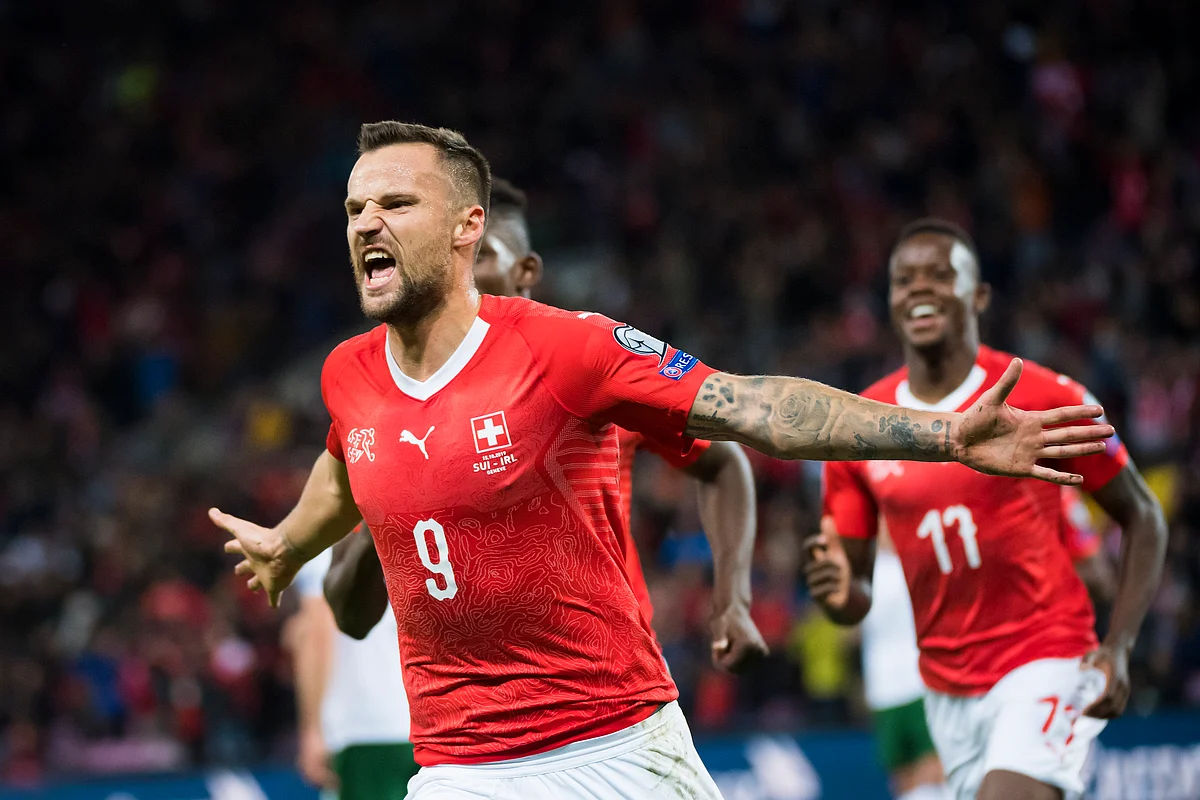Switzerland’s forward Haris Seferovic, celebrates after scoring the first goal of the game against Republic of Ireland, during their Euro 2020 qualifying Group D soccer match at the Stade de Geneve, in Geneva, Switzerland, Tuesday, Oct. 15, 2019.