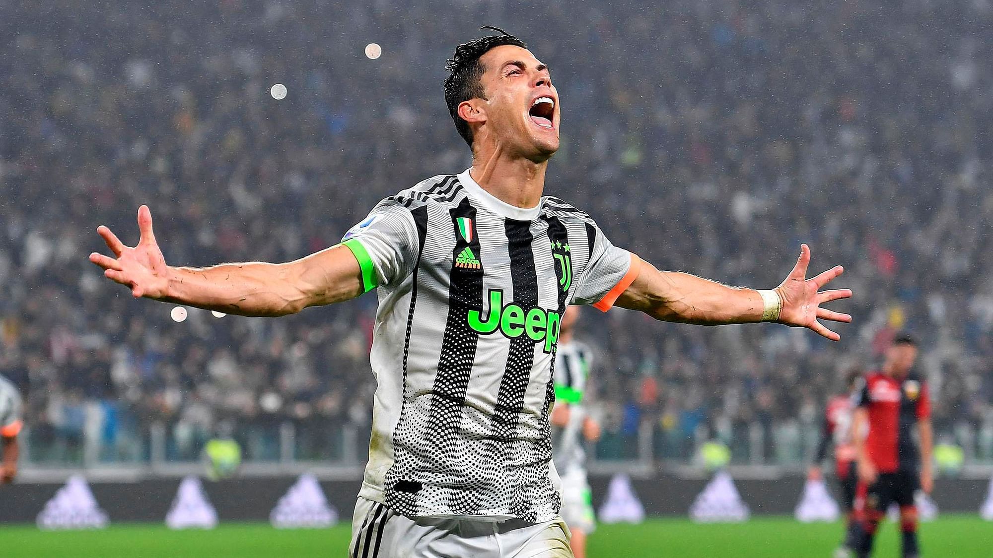 A stoppage-time penalty by Cristiano Ronaldo gave Juventus the 2-1 win over Genoa.
