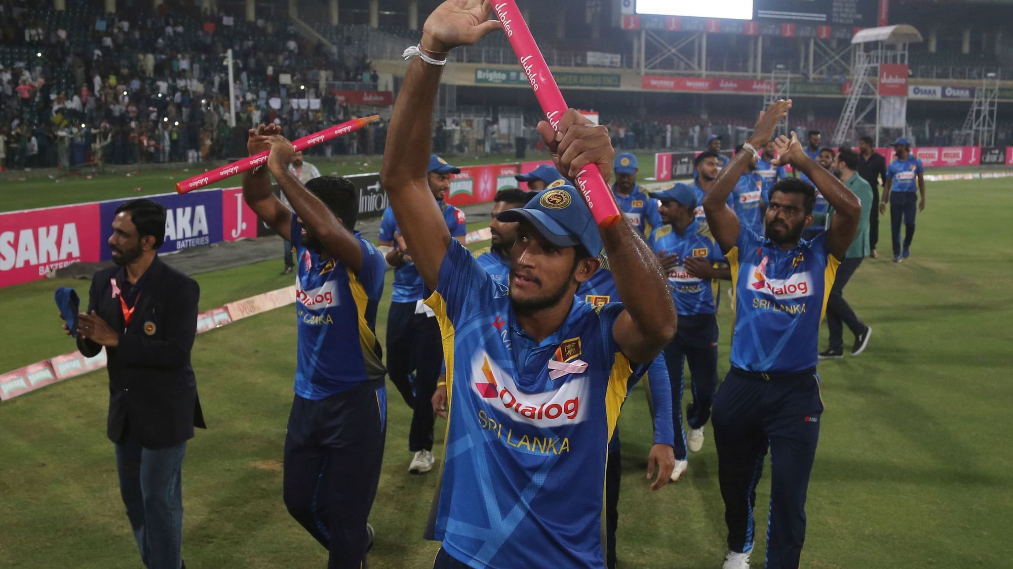 Sri Lankan players celebrate their victory against Pakistan in the final of Twenty20 at the Gaddafi Stadium in Lahore, Pakistan, Wednesday, Oct. 9, 2019.