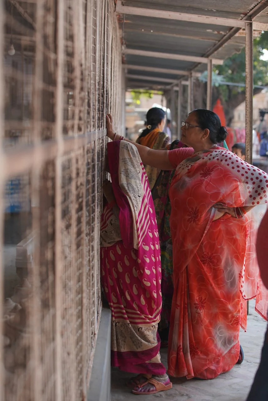A woman praying to the stone that would be used for the throne of Ram Lalla in the temple, when it is buit.