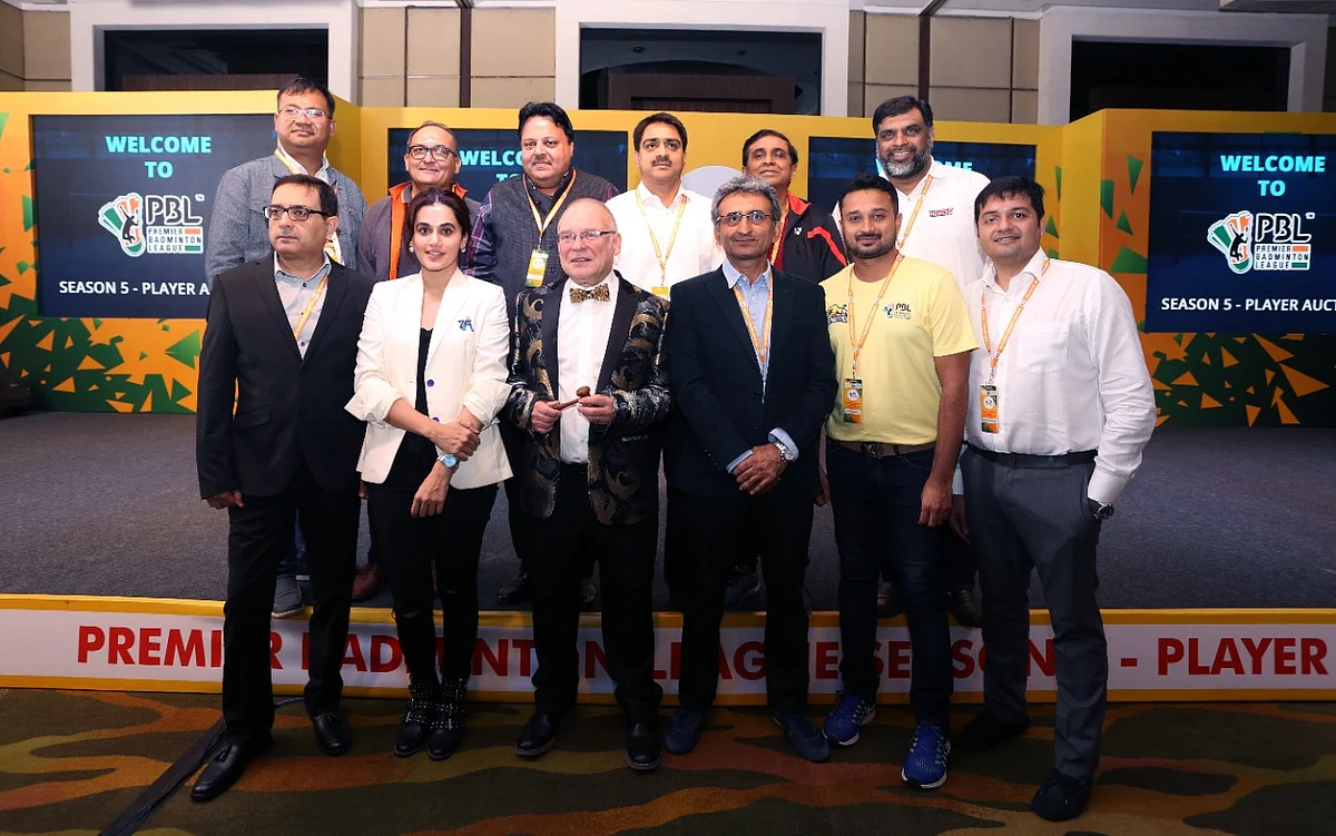 PBL team owners along with the auctioneer ahead of the 2020 Premier Badminton League auction.