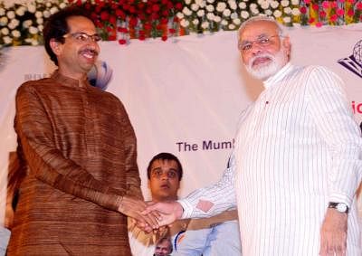BJP Prime Ministerial Candidate and Gujarat Chief Minister Narendra Modi with Uddhav Thackeray in Mumbai on Sept.30, 2013. (Photo: B L Soni/IANS)
