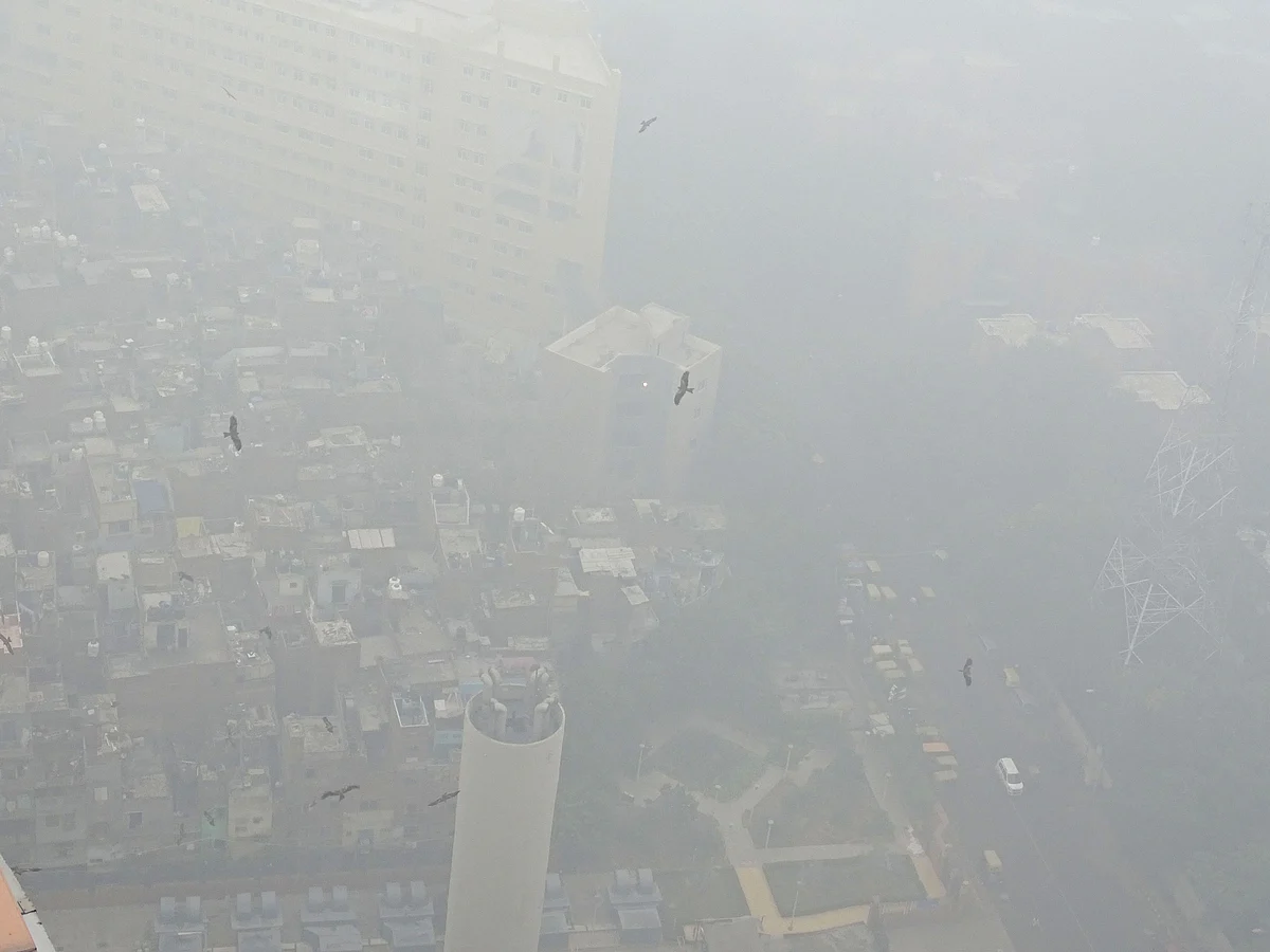 An aerial view of the capital covered in smog. The city was enveloped in a thick layer of smog on the minimum temperature settling at 18.7 degrees Celsius, four notches above the season’s average.