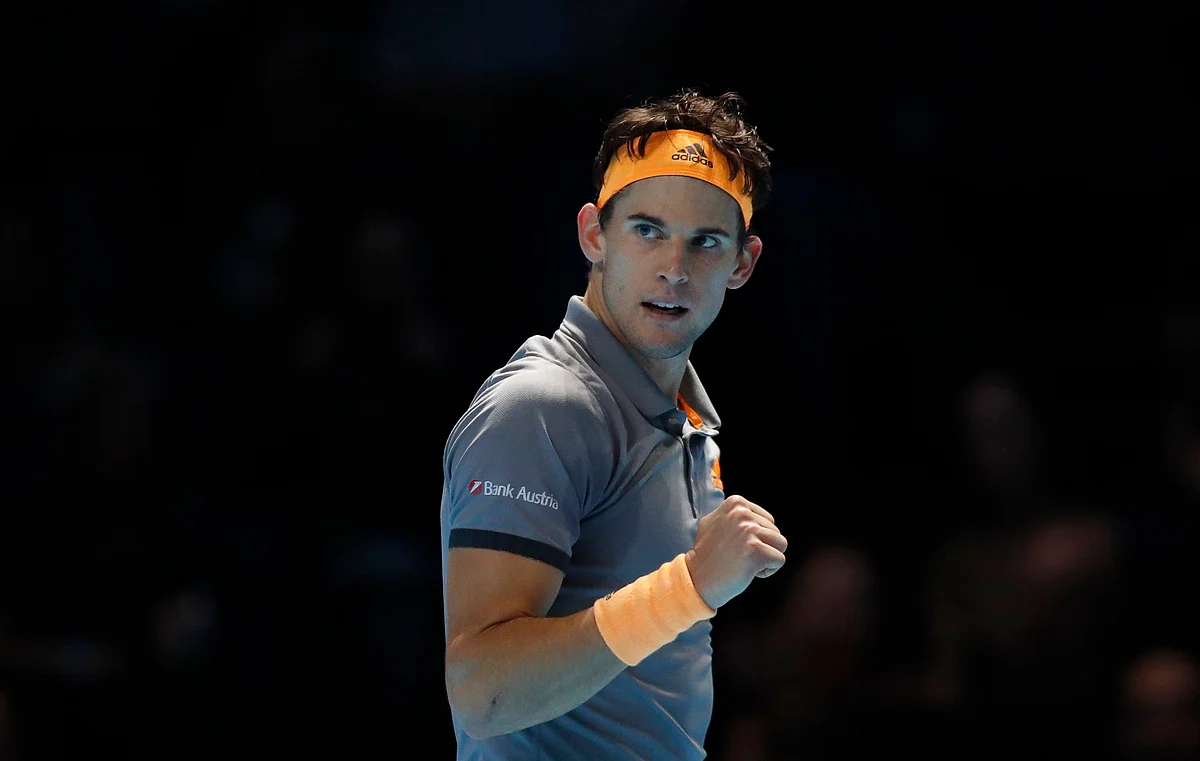 Dominic Thiem outlasted Djokovic 6-7 (5), 6-3, 7-6 (5) to become the first player to advance from the group stage