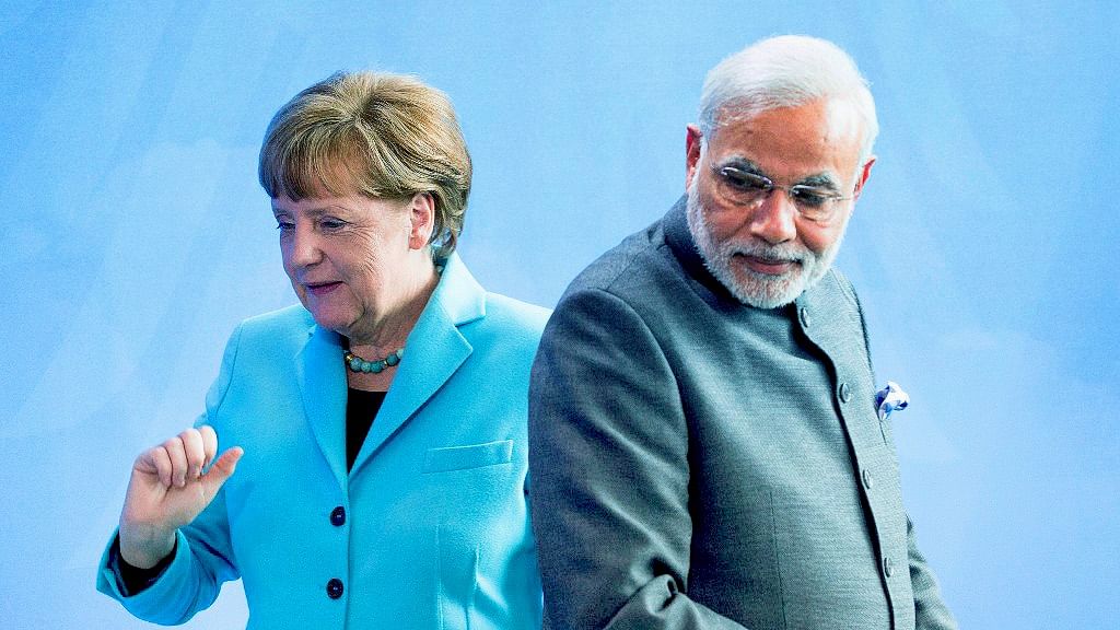  PM Minister Narendra Modi with German Chancellor Angela Merkel.&nbsp;