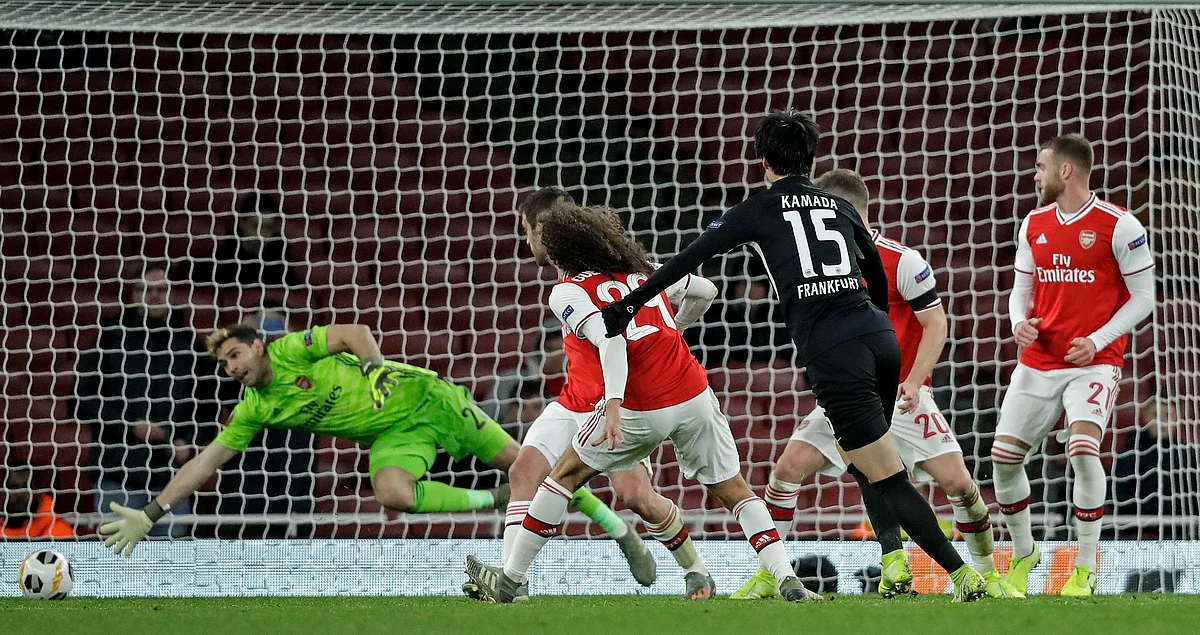 Frankfurt’s Daichi Kamada scores his second goal against Arsenal in their Europa League match between in London on Thursday.