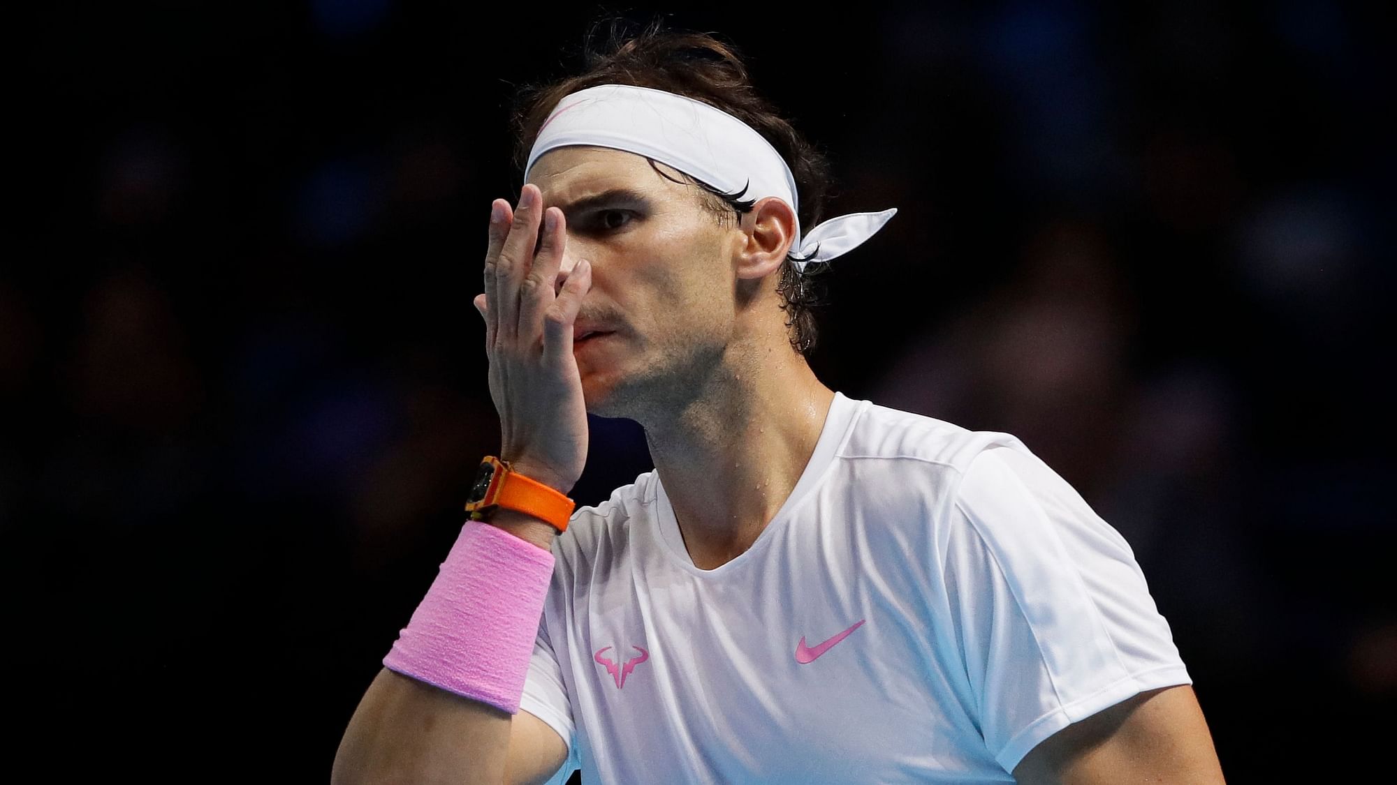 Rafael Nadal of Spain reacts during his ATP World Tour Finals singles tennis match against Alexander Zverev of Germany at the O2 Arena in London, Monday, Nov. 11, 2019.