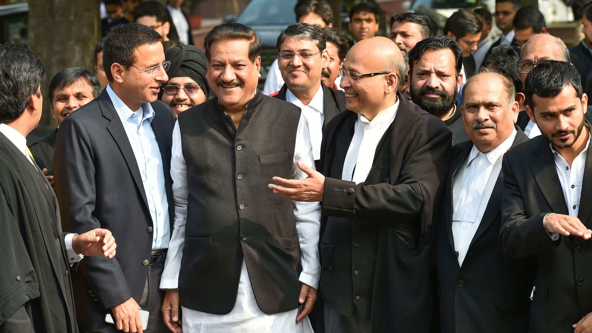  Senior advocate AM Singhvi and Congress leader Randeep Surjewala after the Supreme Court hearing on 24 November.&nbsp;