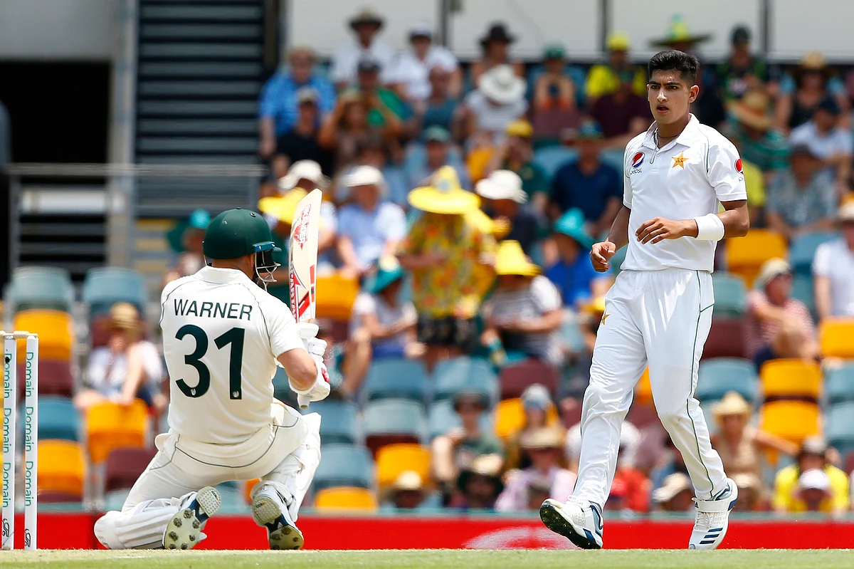 Naseem’s first delivery in Test cricket was 145 kph (90 mph) at Warner, whom he later had rocking back and ending on his knees to avoid a short-pitch ball.