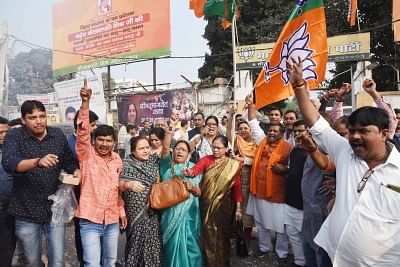 Patna: BJP workers celebrate after party leader Devendra Fadnavis was sworn-in as the Chief Minister of Maharashtra; in Patna on Nov 23, 2019. Maharashtra Governor B.S. Koshyari early on Saturday administered the oath of office to Bharatiya Janata Party leader Devendra Fadnavis as the new Chief Minister of the state and Nationalist Congress Party leader Ajit Pawar as the new Deputy Chief Minister. (Photo: IANS)