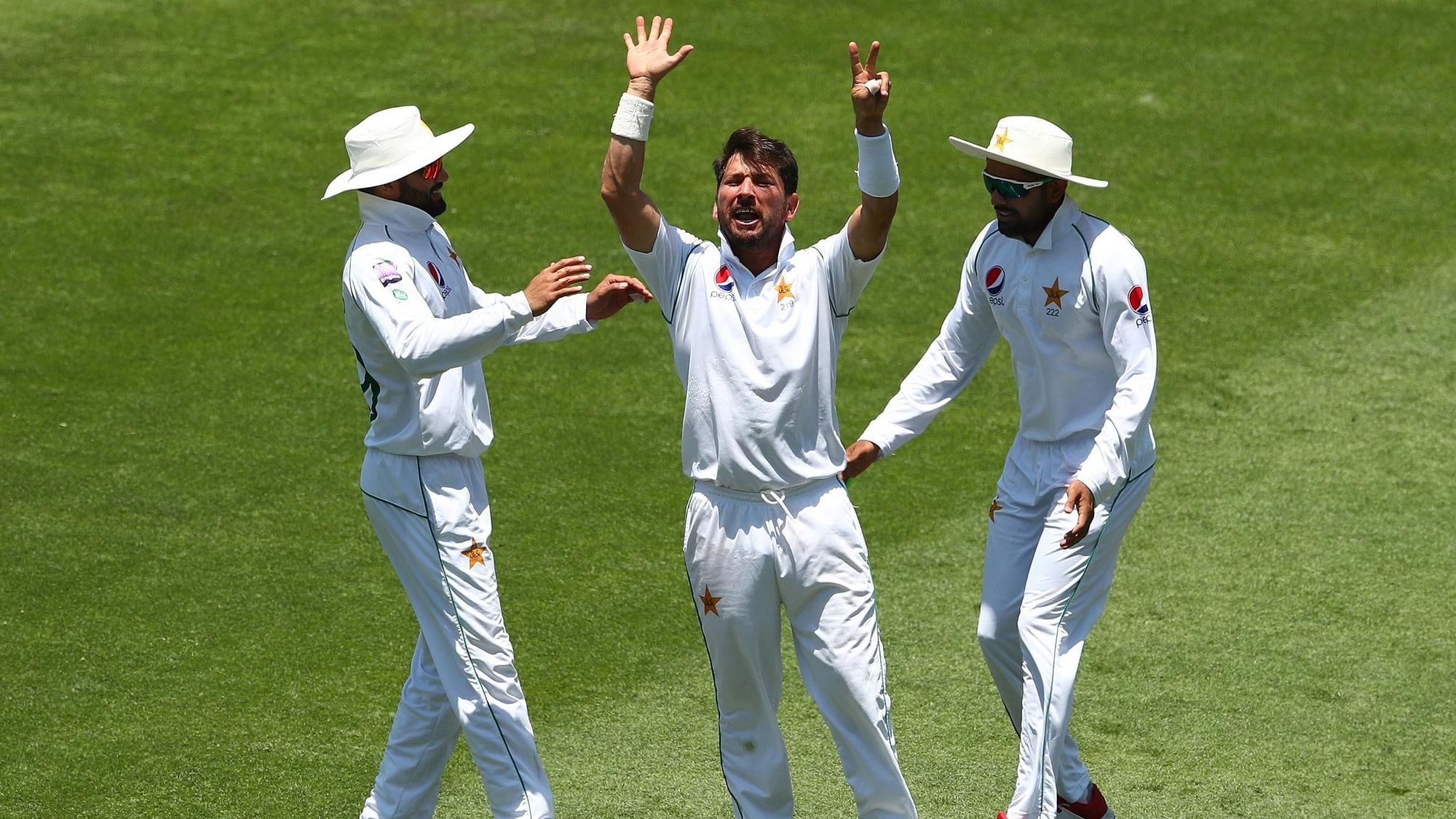 Pakistan’s Yasir Shah raising seven fingers in the air, signalling that he has now dismissed Smith seven times in Test matches.