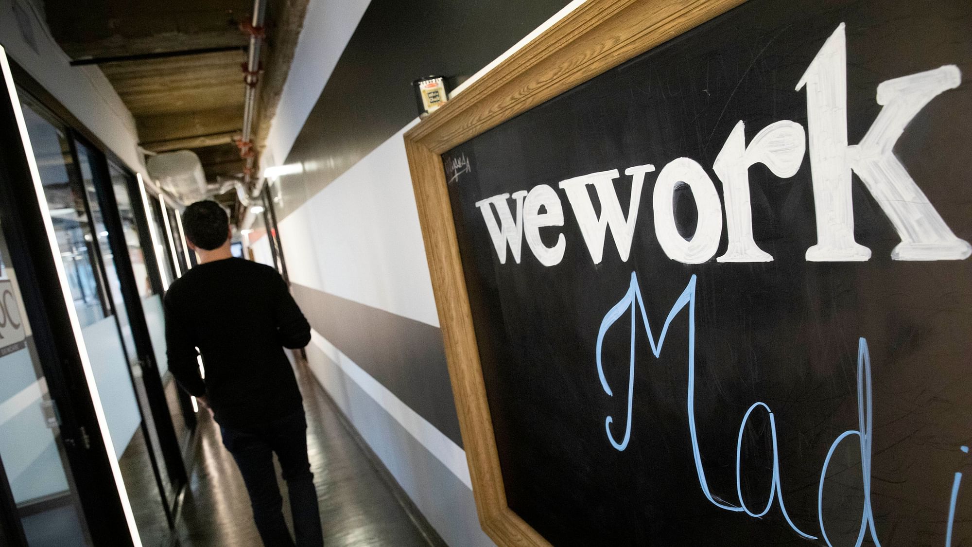 Embattled office sharing startup WeWork said Thursday, 21 November, it will lay off 2,400 employees worldwide as the company struggles to reorganise amid mounting losses.