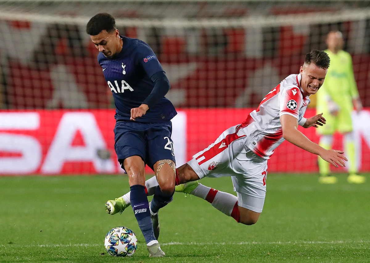 Tottenham’s Dele Alli, left, challenges for the ball with Red Star’s Njegos Petrovic during the Champions League group B match between Red Star and Tottenham, at the Rajko Mitic Stadium in Belgrade, Serbia.