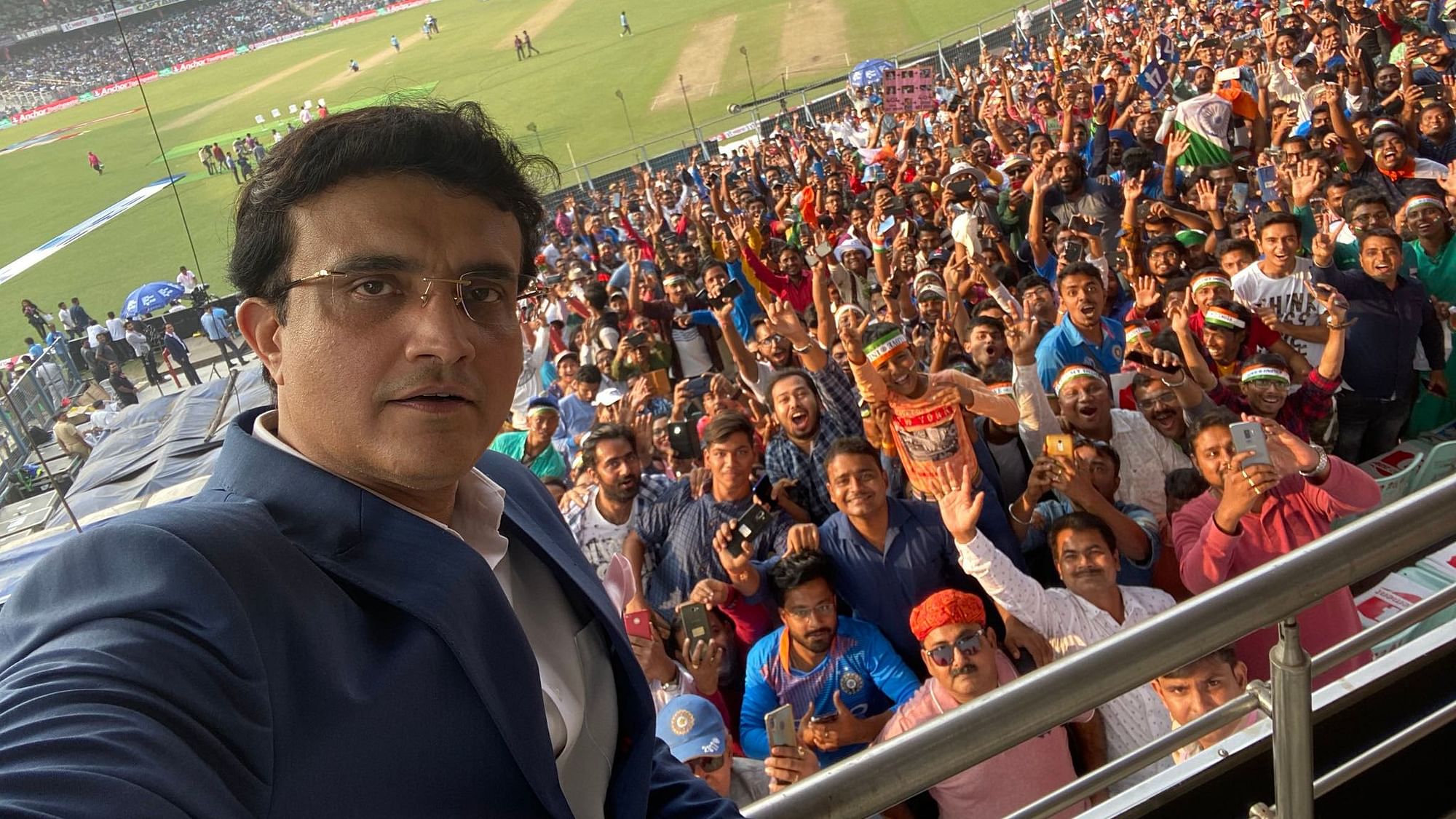BCCI President Sourav Ganguly takes a selfie with the Eden Gardens crowd during the first day of the Pink Ball Test in Kolkata.