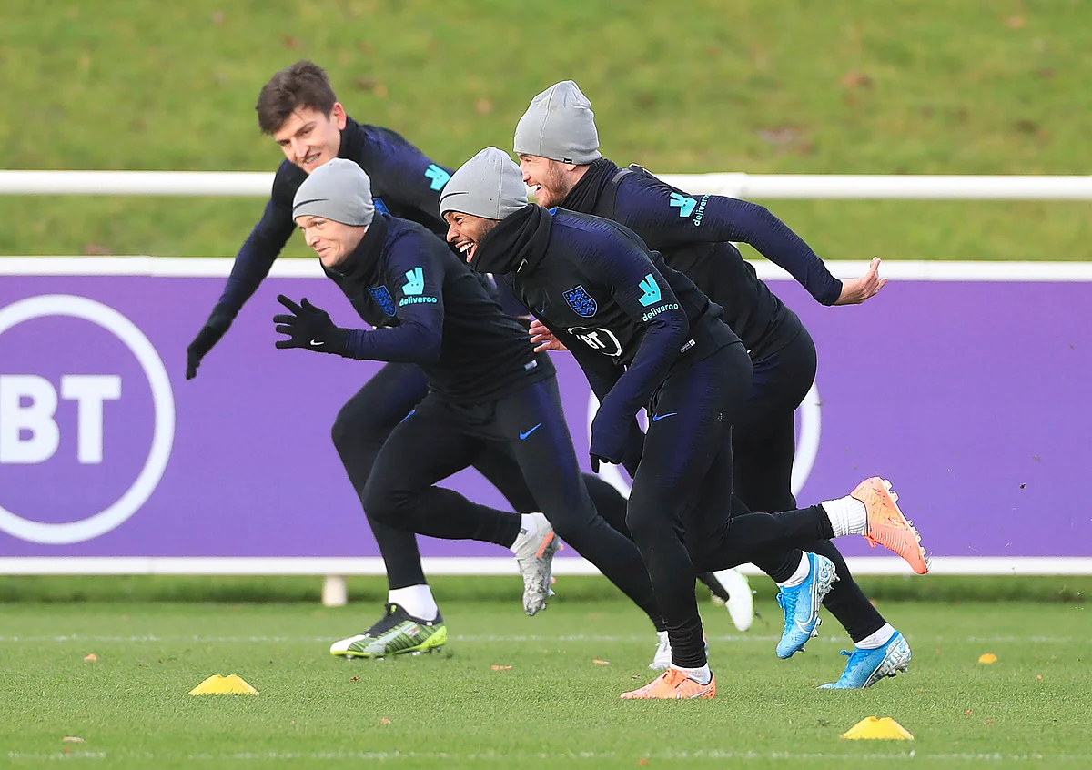 England’s Raheem Sterling, front, attends a training session at St George’s Park, Burton, England,