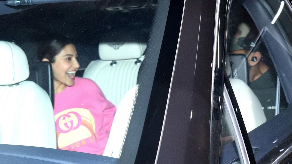 Anushka, who remained inside the car, was looking visibly happy as the couple hugged each other.