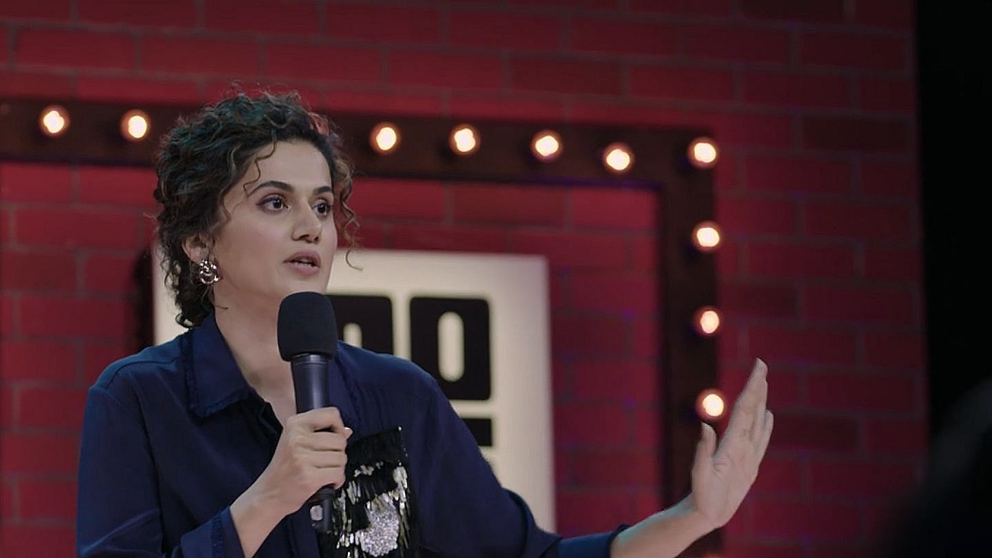 At the cost of looking nervous, Taapsee attempts a stand up for the first time and does a decent job.&nbsp;