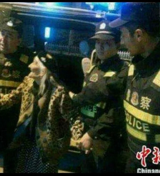 Uighur being taken to the detention centres.