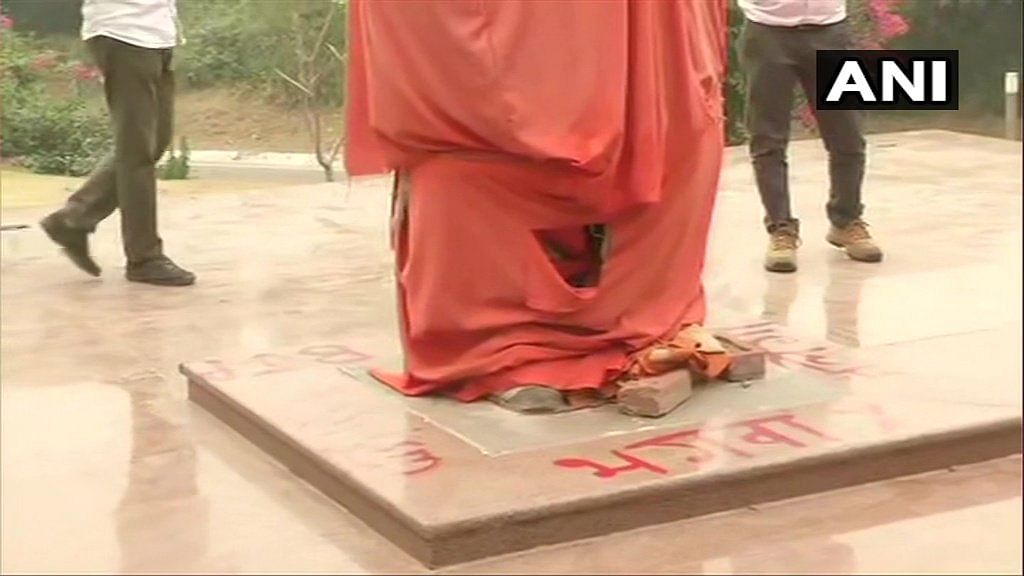 Swami Vivekananda statue defaced with graffiti at JNU campus.