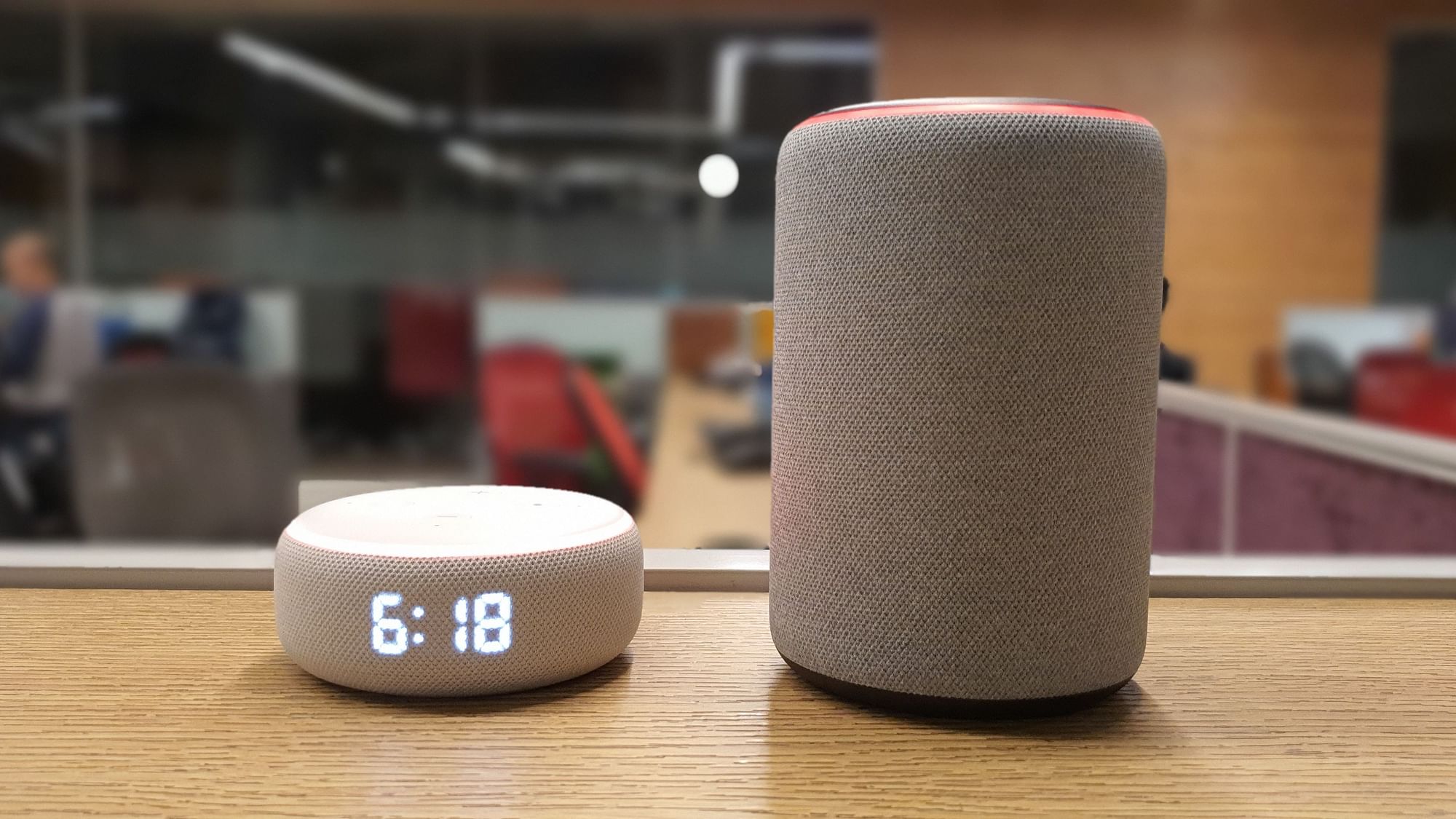 The third-generation Amazon Echo Dot (left) and Echo.