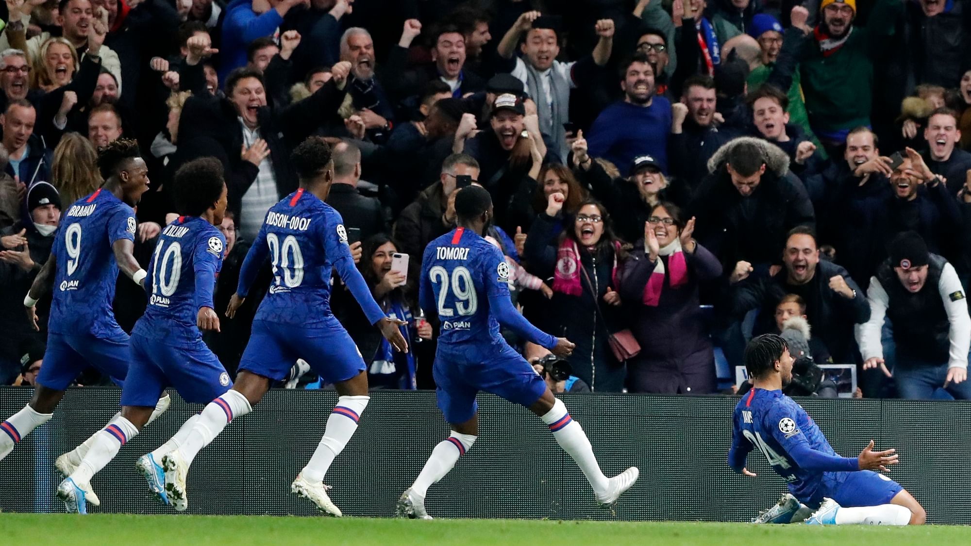 Chelsea celebrate their fourth goal of the game, headed in by defender Reece James.