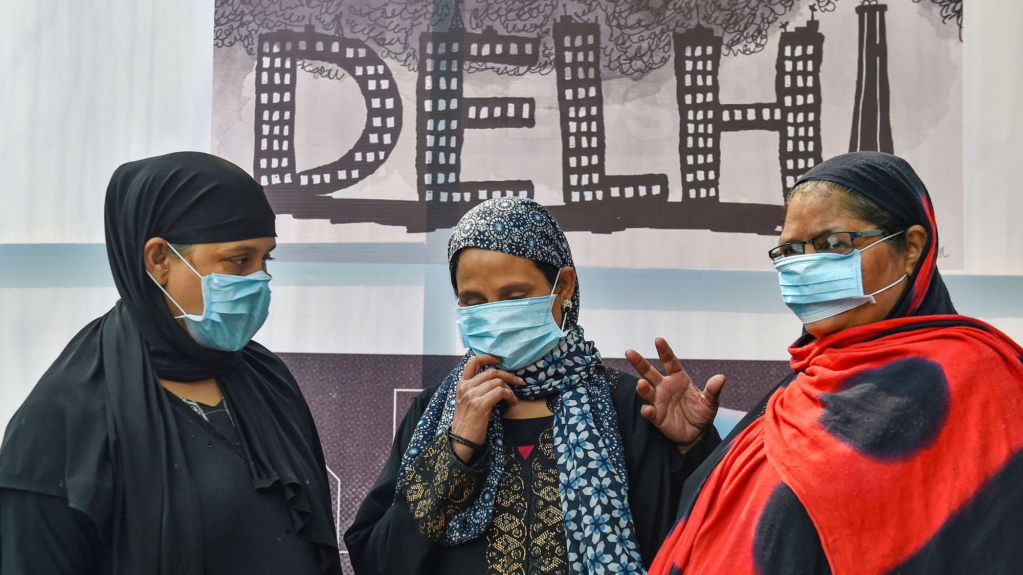  Women are seen wearing masks to get protection from air-pollution.